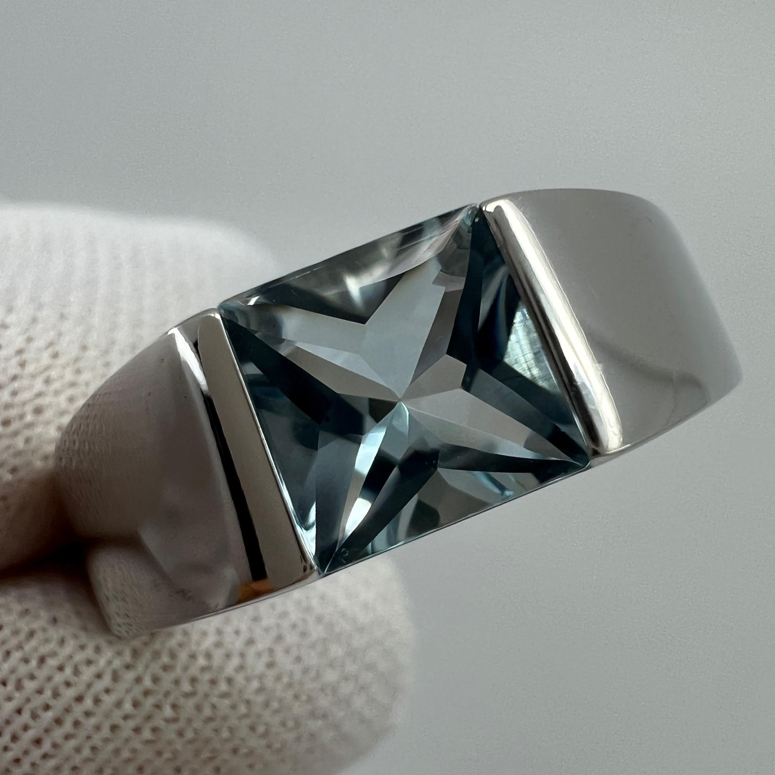 Vintage Cartier Fine Blue Aquamarine 18 Karat White Gold Tank Ring.

Stunning white gold ring with a 6mm tension set fine blue aquamarine.

Fine jewellery houses like Cartier only use the finest of gemstones and this aquamarine is no exception. A