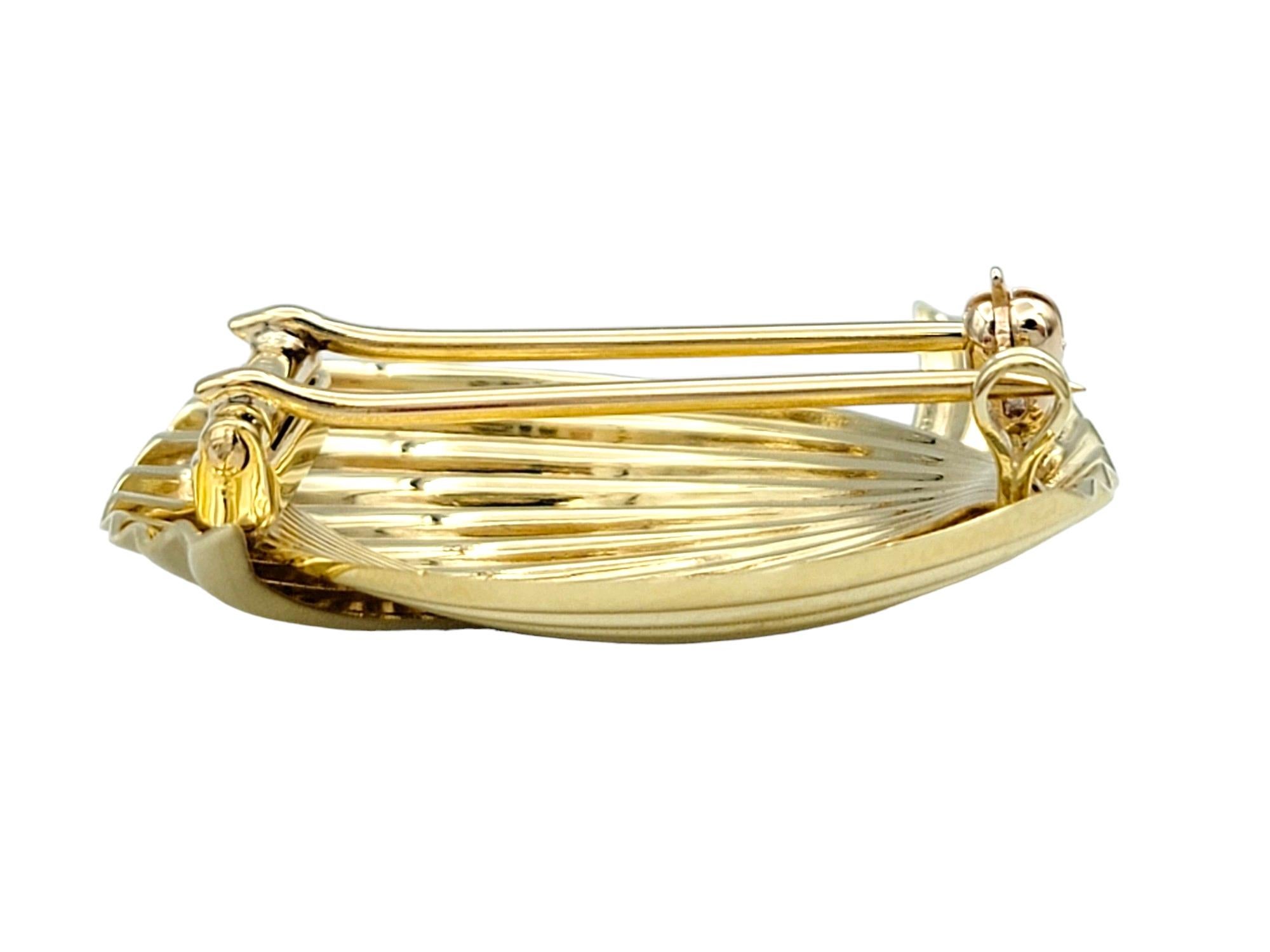 Contemporary Vintage Cartier Bypass Design Ridged Brooch Set in Polished 14 Karat Yellow Gold For Sale