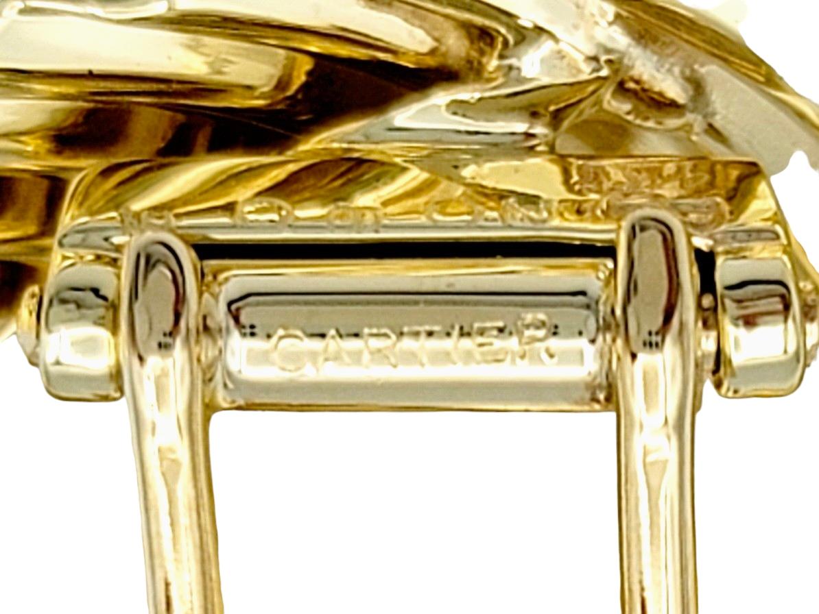Cartier Broche vintage en or jaune 14 carats poli à motif de dérivation en vente 1