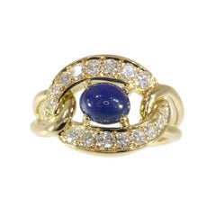Vintage Cartier Cabochon Sapphire and Diamonds 18 Karat Yellow Gold Ring, 1990s