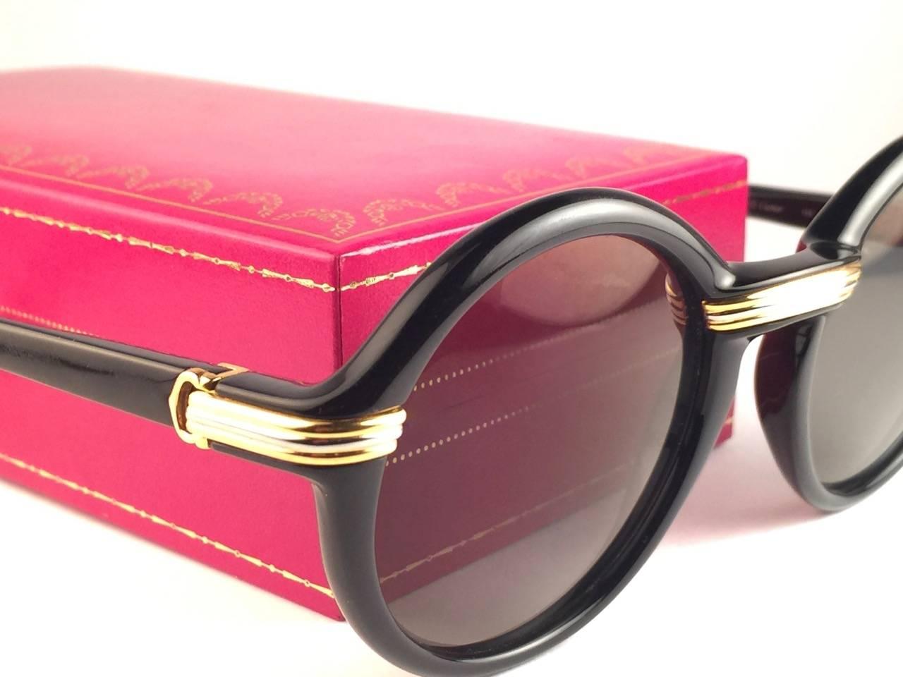 Women's or Men's Rare Vintage Cartier Cabriolet Round Black & Gold 49MM 18K Gold Sunglasses 1990 For Sale