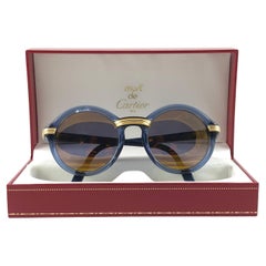 Lunettes de soleil vintage Cartier Cabriolet rondes bleu translucide 49MM 18K France