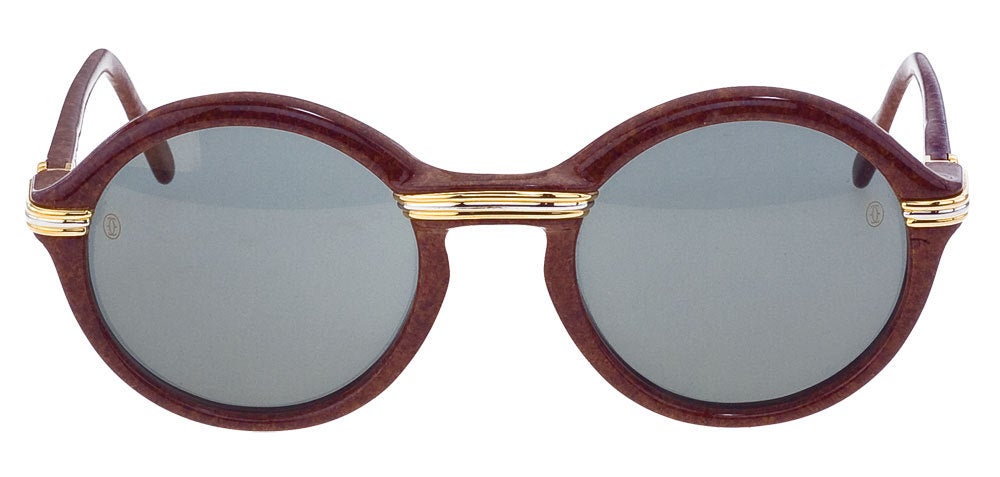 Timeless Cartier Cabriolet sunglasses with gold and silver details on the nose and temple.

Size 52 22