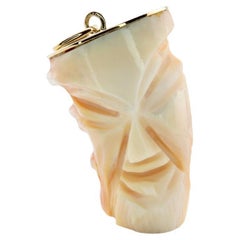 Retro Cartier Carved Figural Coral Pendant Necklace in 18K Yellow Gold