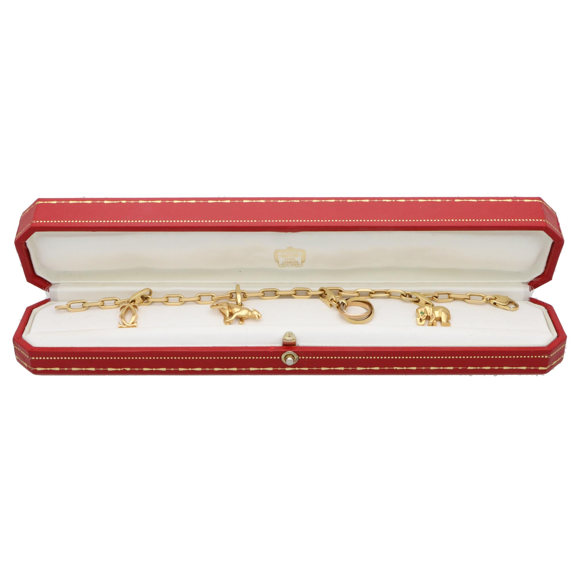 Women's or Men's Vintage Cartier Charm Bracelet Set in 18k Yellow Gold