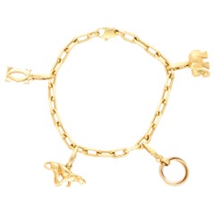 Cartier: 18 Karat Gelbgold Vintage-Armband mit Anhängern