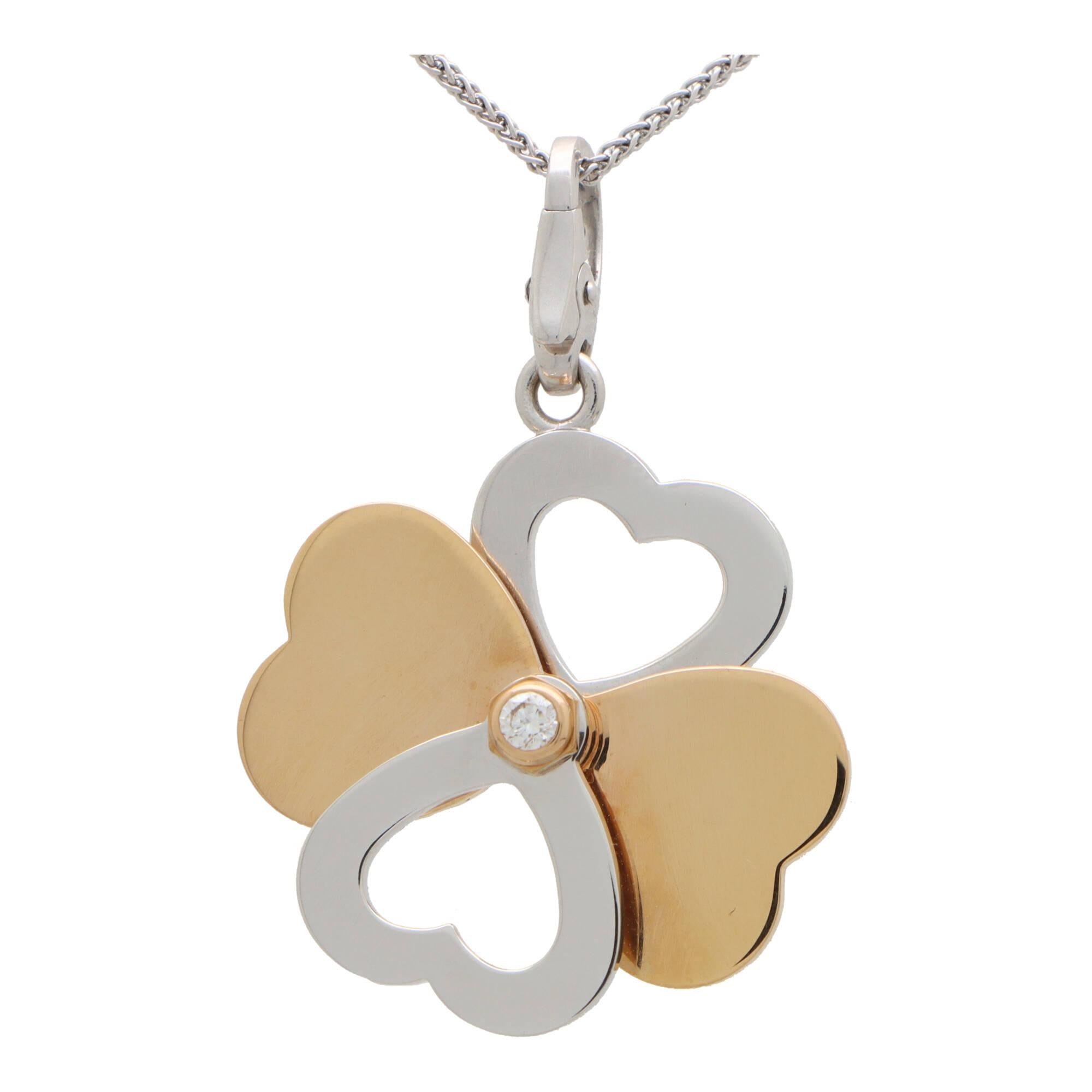 A beautiful vintage Cartier diamond heart clover charm in 18k rose and white gold.

The charm is formed out of four polished heart motifs, which move to create a number of different silhouettes, including a clover! To the centre of the charm is a
