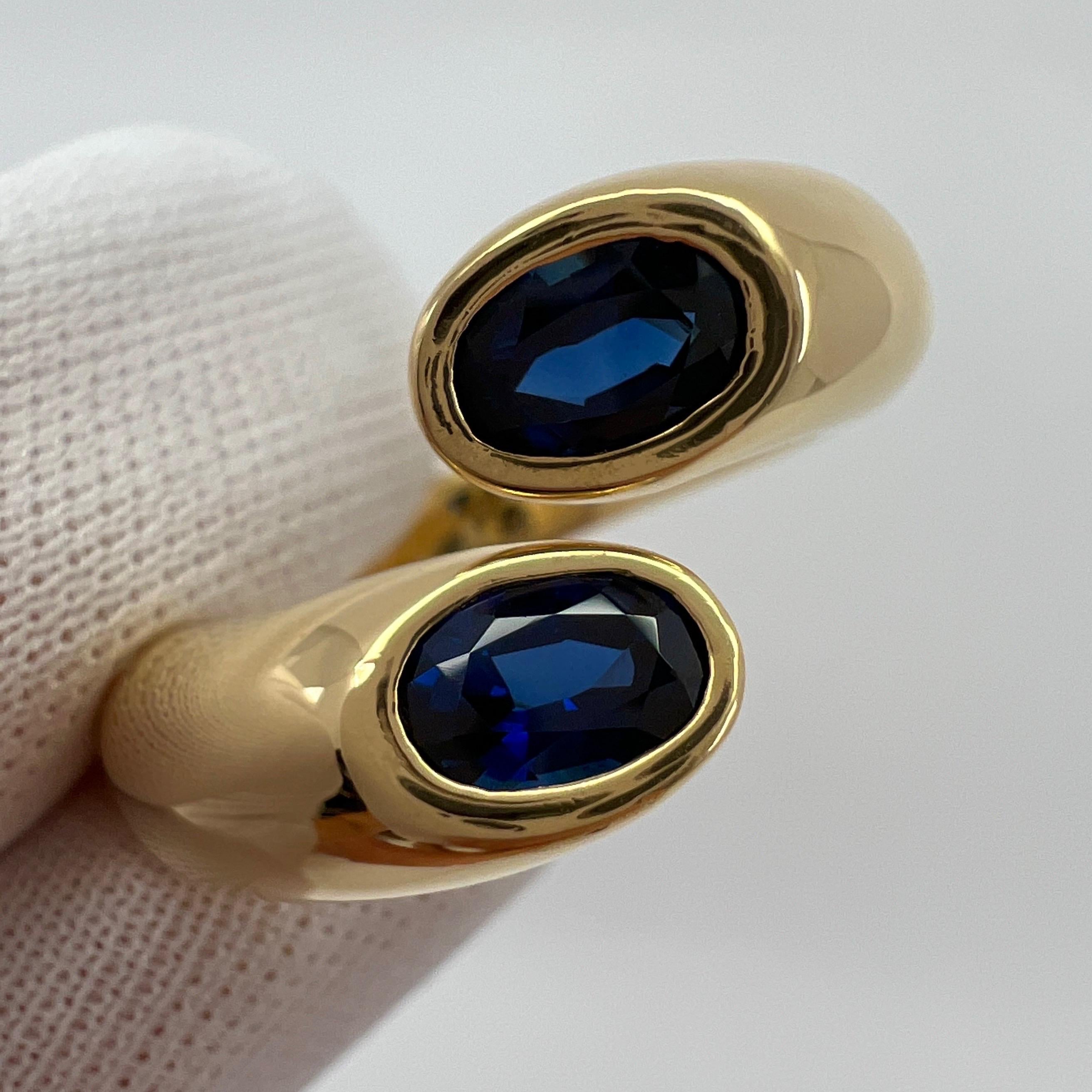 Vintage Cartier Deep Blue Sapphire 18k Yellow Gold Bypass Ring.

Stunning yellow gold ring set with 2 fine deep blue oval cut sapphires. Fine jewellery houses like Cartier only use the finest of gemstones and these sapphires are no exception. 2