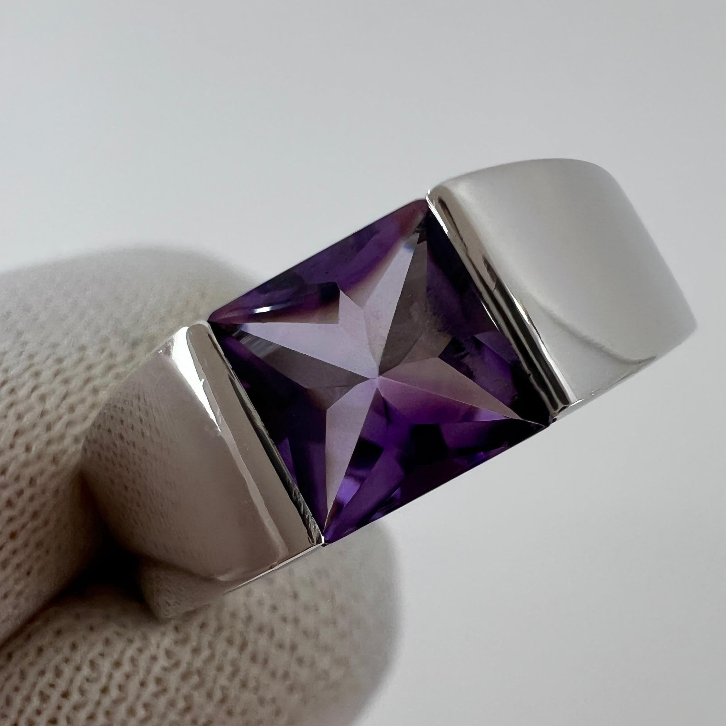 Cartier Purple Amethyst 18 Karat White Gold Tank Ring.

Stunning white gold ring with a fine 6mm tension set deep purple amethyst. Fine jewellery houses like Cartier only use the finest of gemstones and this amethyst is no exception. A top amethyst