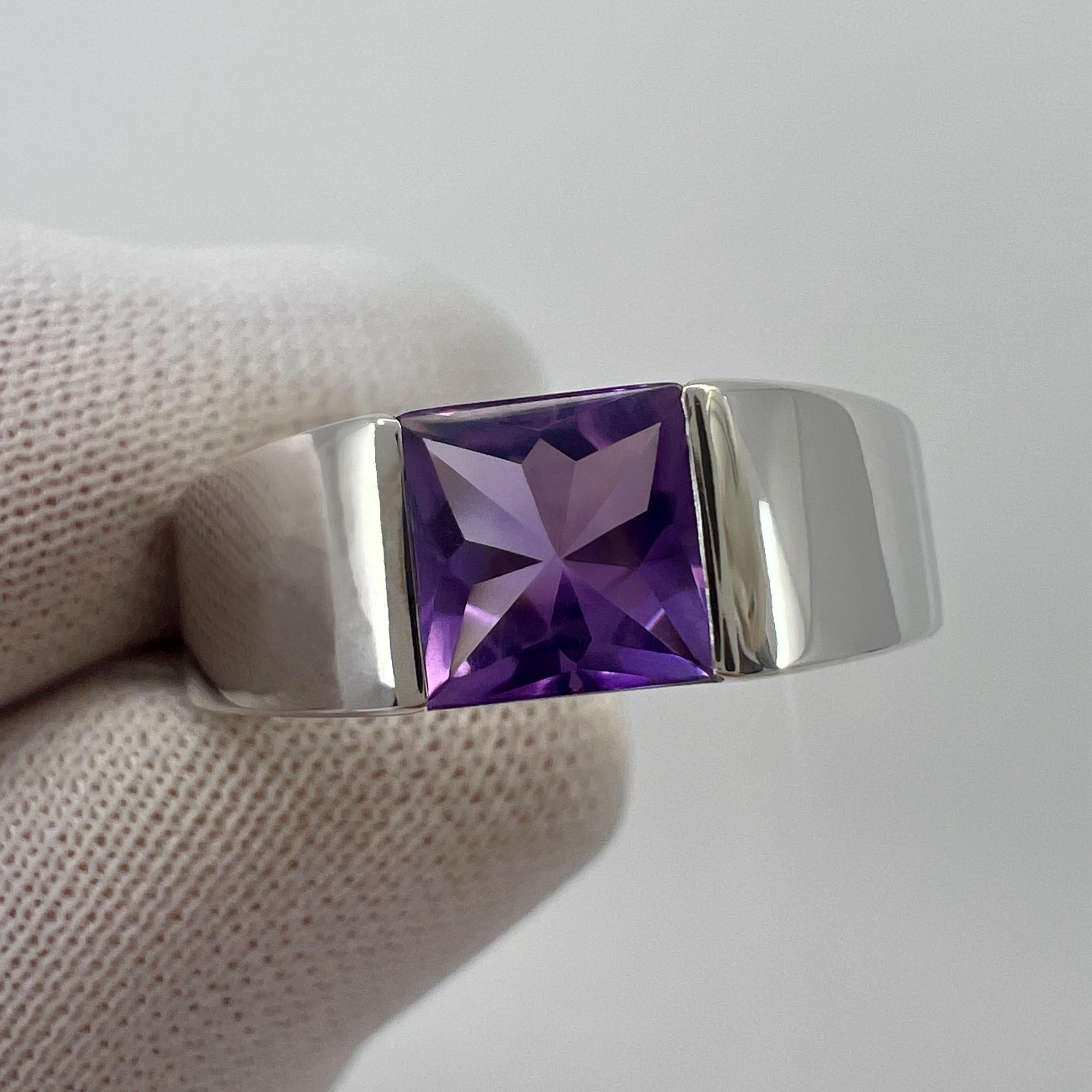 Vintage Cartier Purple Amethyst 18k White Gold Tank Band Ring.

Stunning white gold ring with a fine 6mm tension set deep purple amethyst. Fine jewellery houses like Cartier only use the finest of gemstones and this amethyst is no exception. 
A top