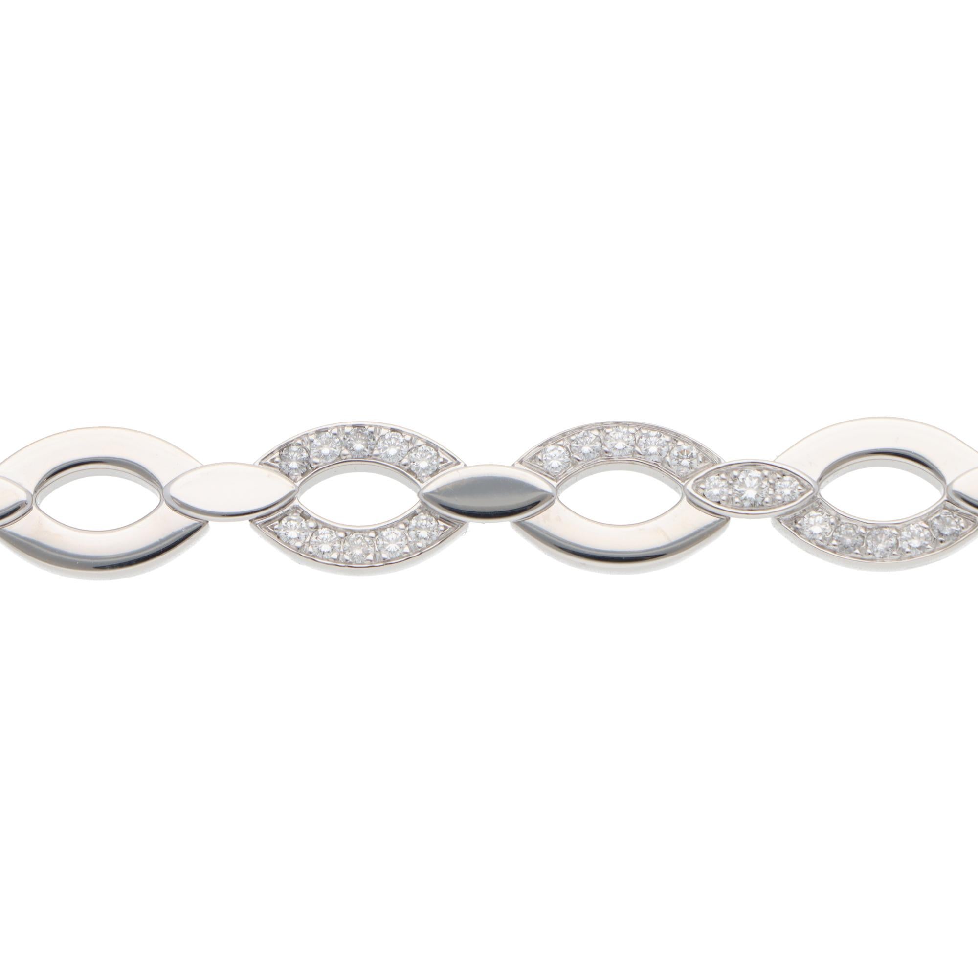 A beautiful vintage Cartier Diadea diamond necklace set in 18k white gold.

From the discontinued Diadea collection, the necklace is composed of 28 beautifully crafted oval links, all of which are connected with a smaller oval panel. Aspects of the