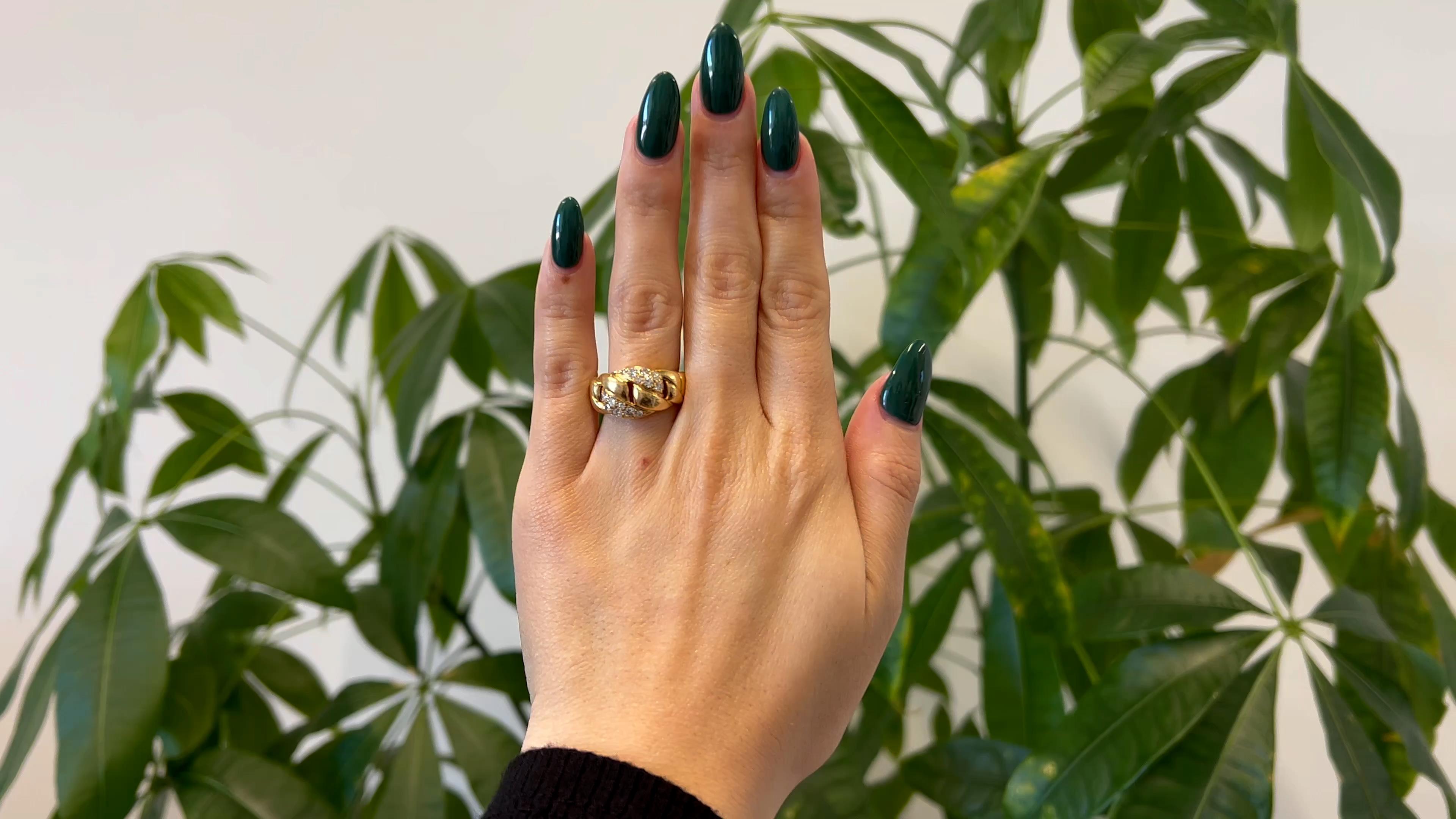 Ein Vintage Cartier Diamant 18k Gelbgold Curb Link Ring. Mit 14 runden Diamanten im Brillantschliff mit einem Gesamtgewicht von ca. 0,50 Karat, eingestuft in Farbe F, Reinheit VVS-VS. Gefertigt aus 18 Karat Gelbgold, signiert Cartier, Seriennummer