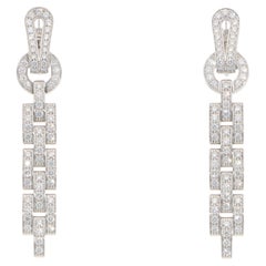 Orecchini vintage con diamanti Cartier Agrafe in oro bianco