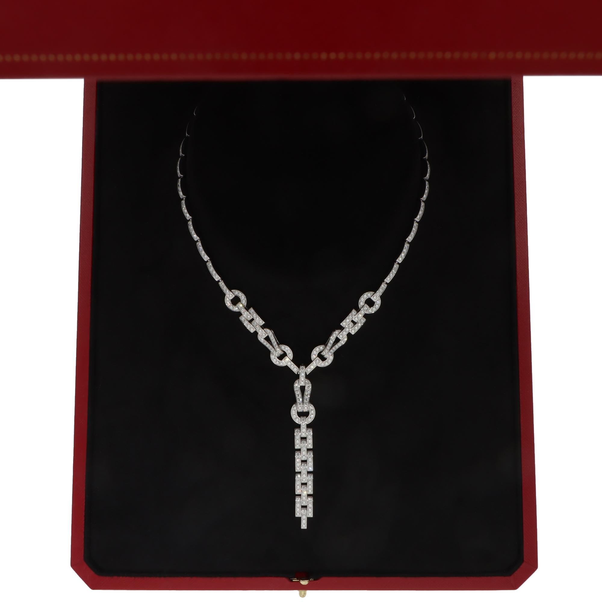 A beautiful vintage Cartier diamond ‘Agrafe’ necklace set in 18k white gold.

The piece is composed of an articulated chain design paved with 320 brilliant-cut diamonds, totalling 6.88 carats which reflect the light elegantly whilst worn on the
