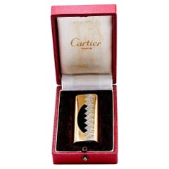 Cartier Briquet vintage en or jaune 18 carats avec diamants et onyx