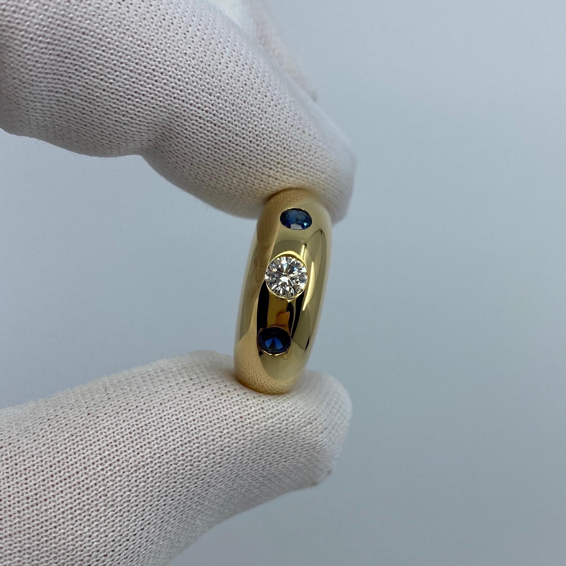 Vintage Cartier Diamond & Blue Sapphire 18k Yellow Gold Three Stone Gypsy Ring.

Stunning yellow gold Cartier ring set with a beautiful 0.30ct centre diamond with F/G Colour and VS1-VVS2 clarity. This is accented by 2 fine deep blue sapphires approx