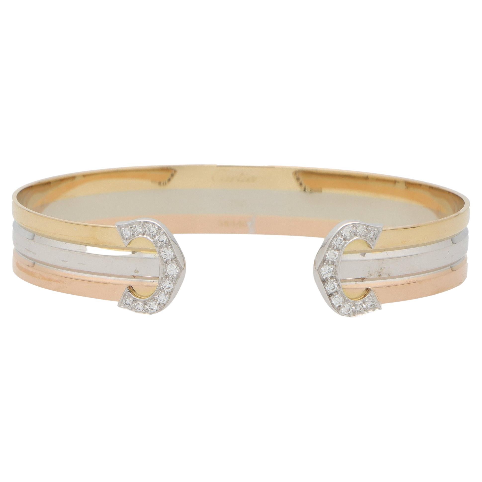 Vintage Cartier Diamond Double C Bangle in 18k Rose, Yellow and White Gold