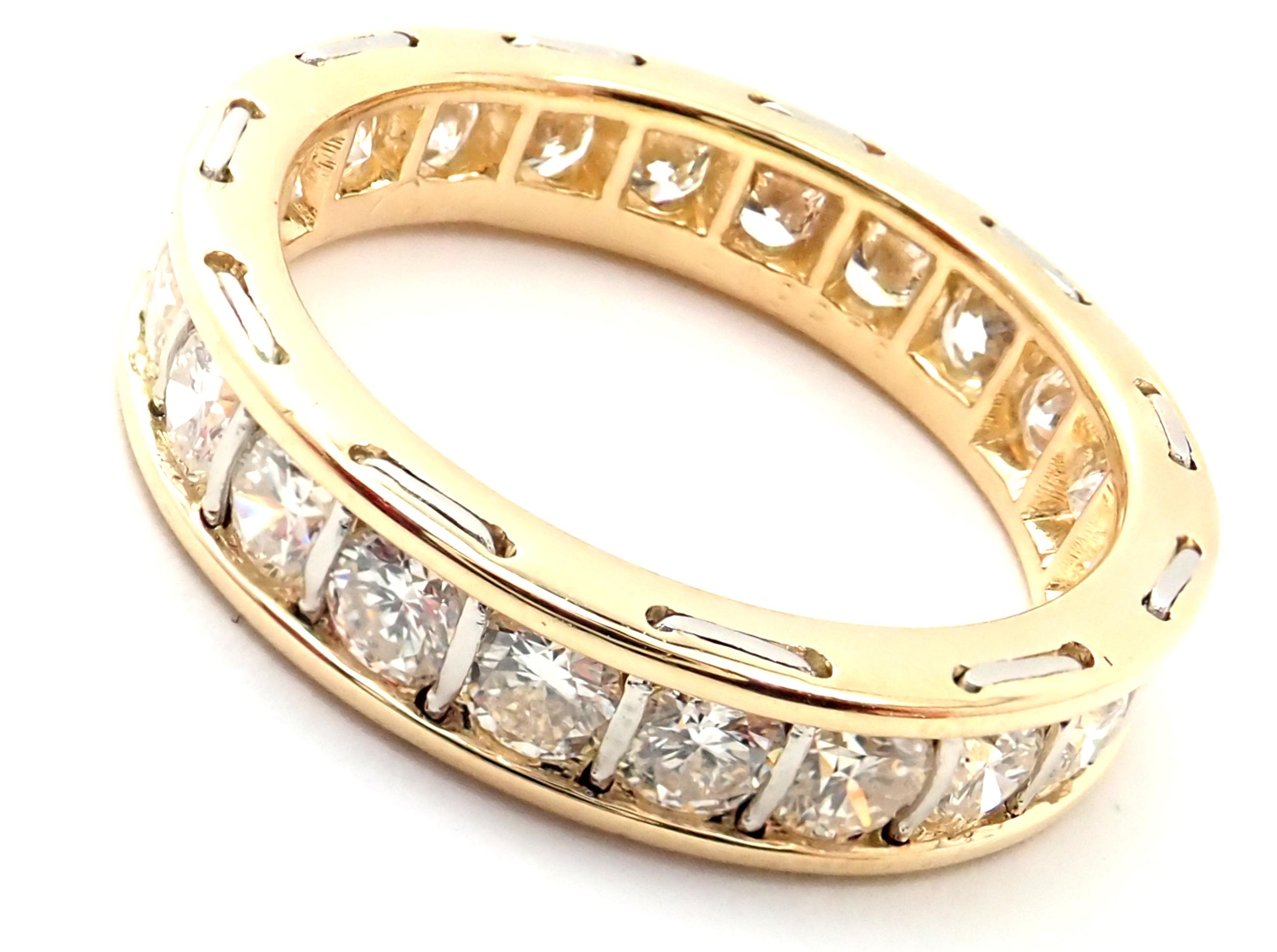 18k Yellow Gold Diamond Eternity Band Ring by Cartier.
With 22 round brilliant cut diamonds VVS1 clarity, E color total weight approx. 1.5ctw
Details:
Ring Size: 5.5
Weight: 4.1 grams 
Width: 4mm
Stamped Hallmarks:  Cartier 750 949978
*Free Shipping