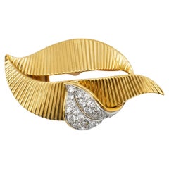 Cartier Broche vintage à motif botanique en or et diamants