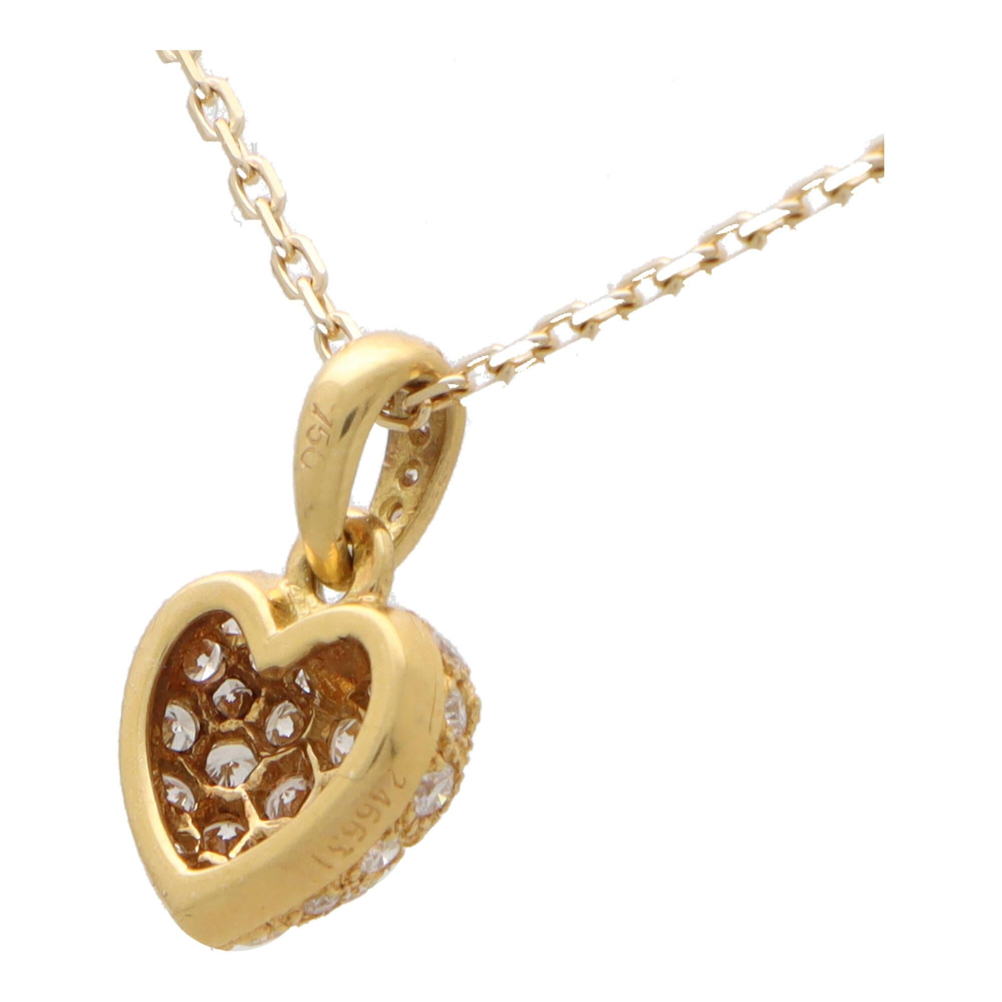 A beautiful vintage Cartier diamond heart pendant necklace set in 18k yellow gold.

From a now discontinued 1990’s Cartier collection, the pendant depicts a classic heart motif. The pendant is pave set with approximately 30 round brilliant cut