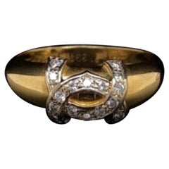 Cartier Bague vintage à logo en or jaune 18 carats et diamants
