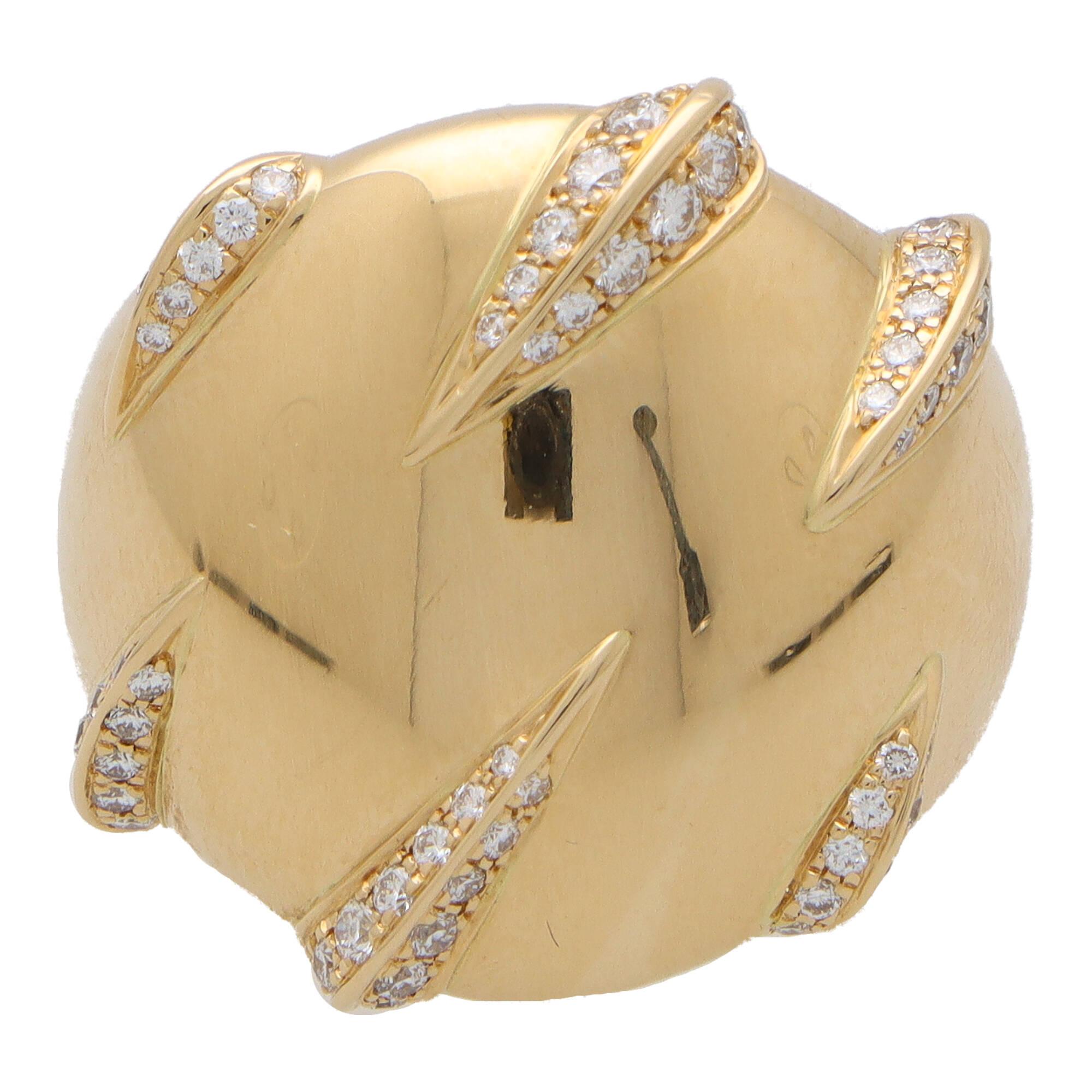 An extremely beautiful vintage Cartier ‘Panther Claw’ diamond ring, set in 18k yellow gold.

This unique looking piece is composed of a large circular motif, with six panther claws grasping around it. Each panther claw is perfectly pave set with