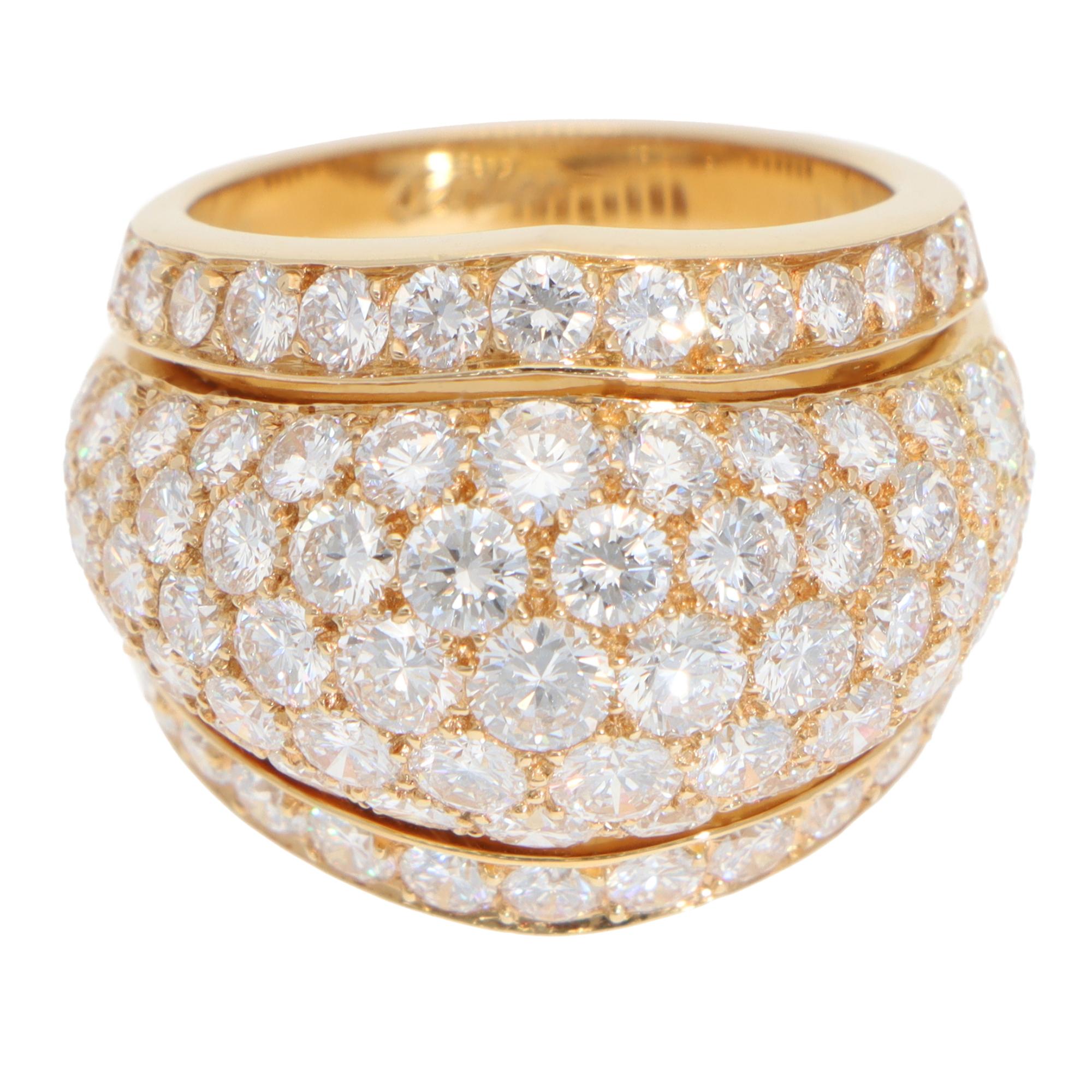 A beautiful vintage Cartier pavé diamond ring set in 18k yellow gold. 

The ring is set with exactly 87 round brilliant cut diamonds, all of which are bead set within the dome design. The differential sizes and orientation of the diamonds enhance