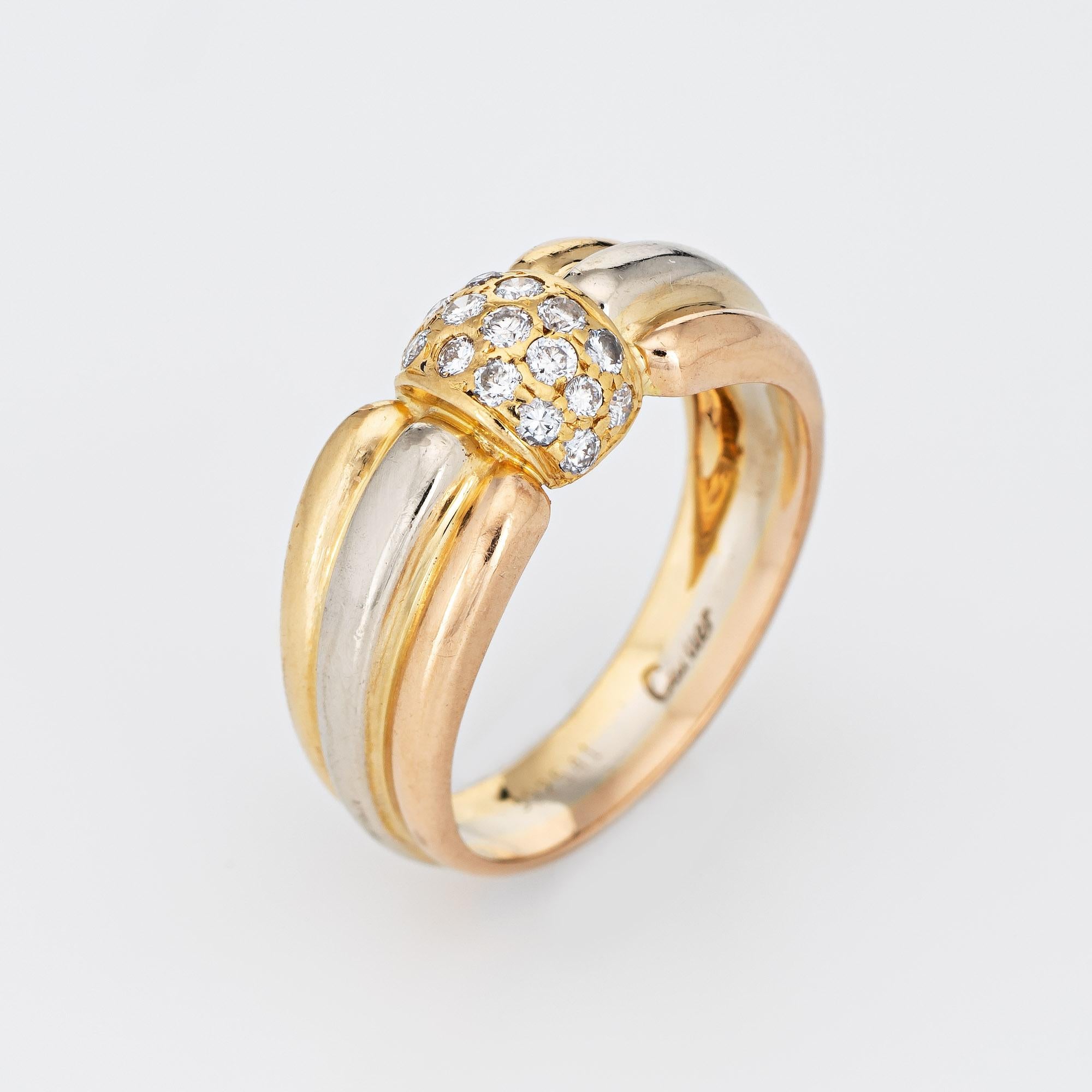 Vintage Cartier diamond ring crafted in 18 karat yellow, rose & white gold (circa 1980s to 1990s).  

17 round brilliant cut diamonds total an estimated 0.34 carats (estimated at G-H color and VS1-2 clarity).

The out of production Cartier ring