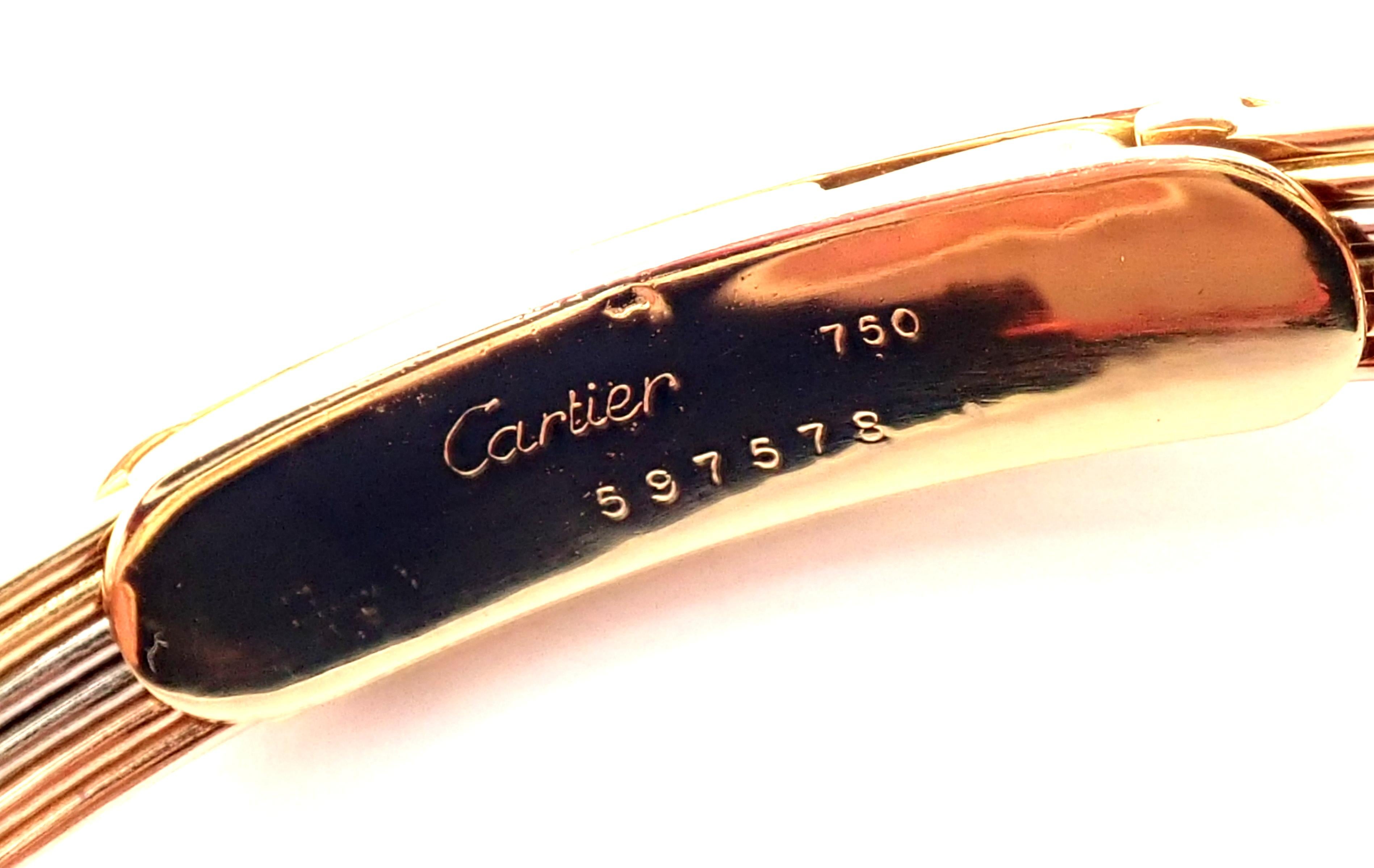 Dreifarbiger Gold-Armreif von Cartier mit Diamant und Saphir 6