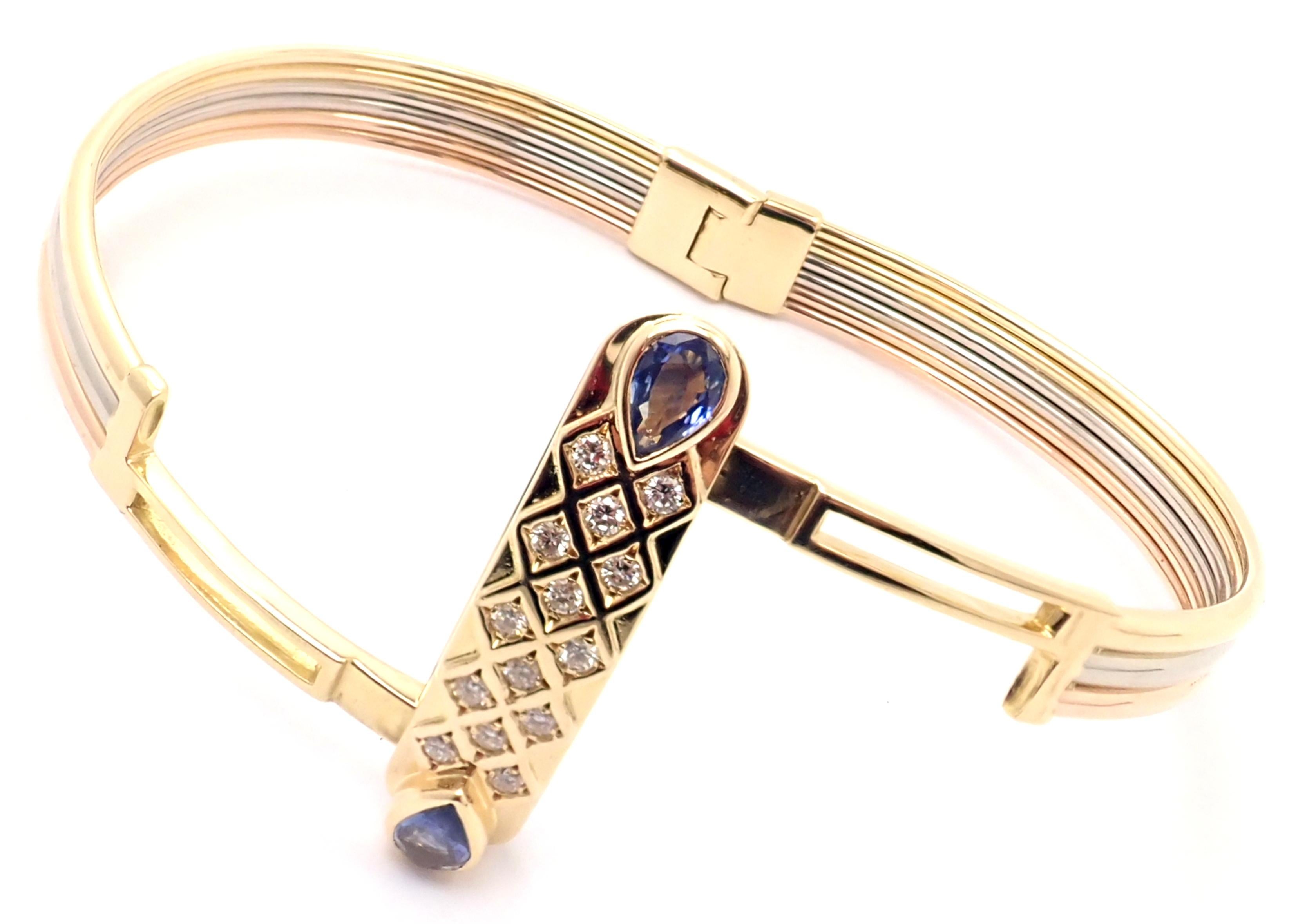18k Tri-Color Gold Diamant Saphir Vintage Armreif Armband von Cartier. 
Mit 14 runden Diamanten im Brillantschliff VVS1 Klarheit, E Farbe Gesamtgewicht ca. .50ct
2 birnenförmige Saphire Gesamtgewicht ca. 1ct
Dieses Armband kommt mit einer
