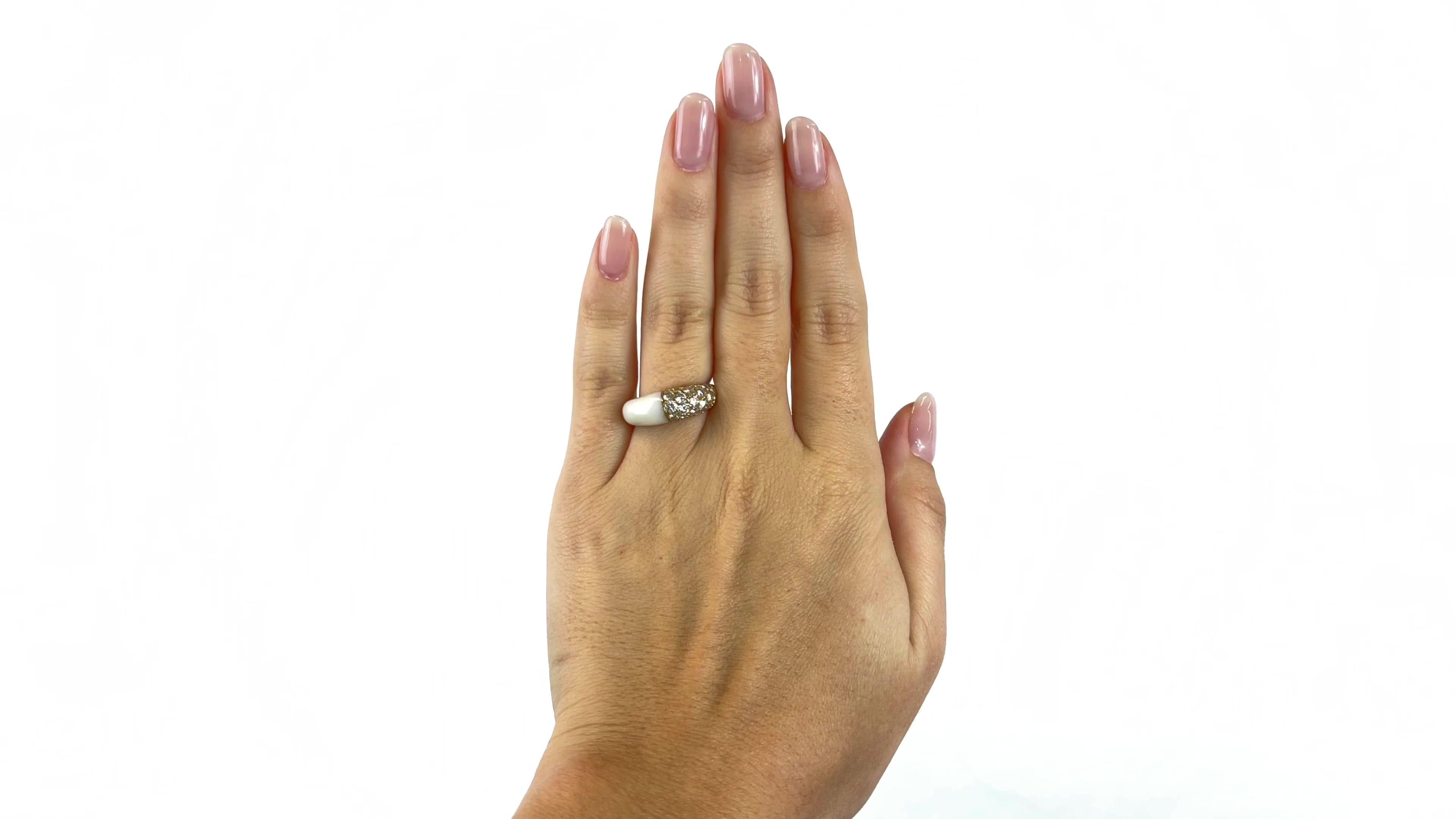 One Vintage Cartier Diamond White Coral 18 Karat Gold Ring. Featuring 40 round brilliant cut diamonds with a total weight of approximately 1.24 carats, graded D-E color, VVS clarity. Accented by one piece of polished, white coral. Crafted in 18