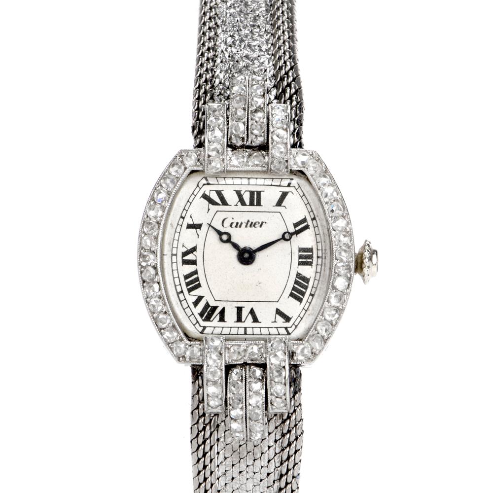  This elegant 1920s Cartier diamond ladies’ wrist watch has a clever more fashionable later added-on 1950s white gold bracelet  crafted in 18-karat white gold. Wrist band is rendered in textured white gold with scaled sides. The case is pave-set