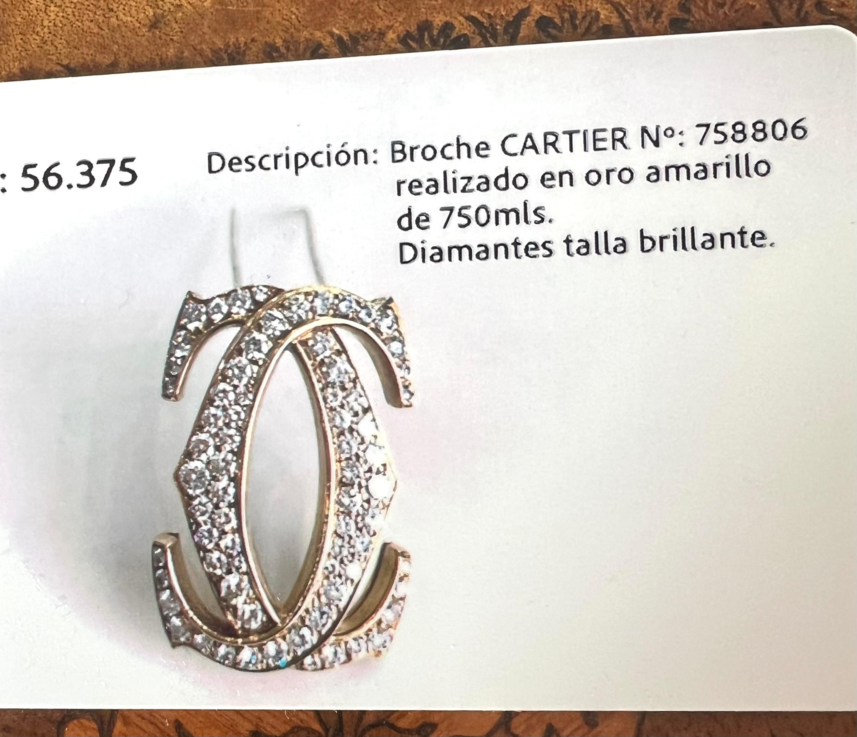Vintage Cartier: 18 Karat Gelbgold Diamantbrosche mit Doppel-C-Motiv-Diamant-Motiv (Brillantschliff) im Angebot