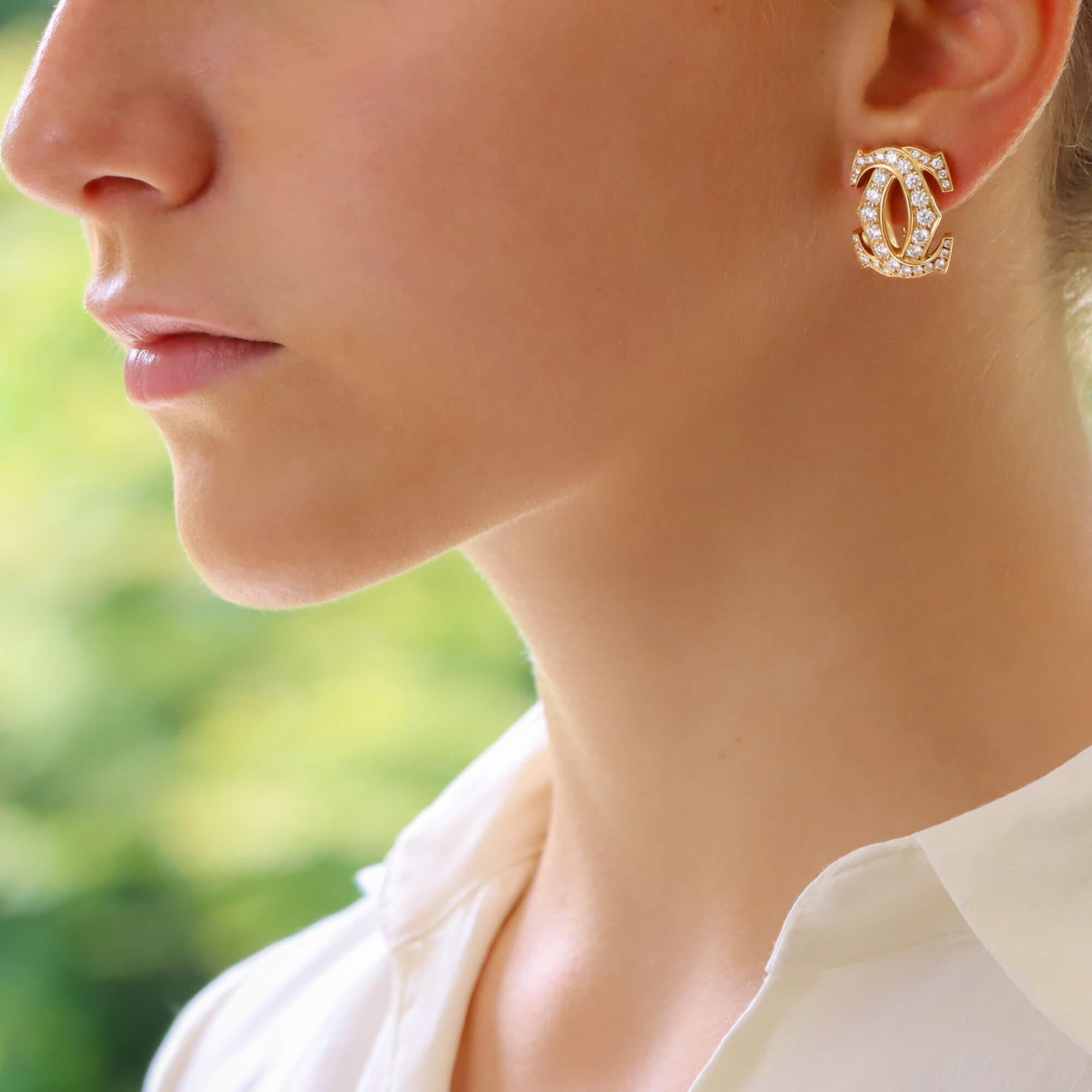 Round Cut Vintage Cartier Double C Motif Diamond Earrings Set in 18k Yellow Gold