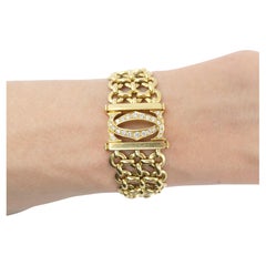 Pulsera vintage Cartier Doble C Penélope Oro Diamante