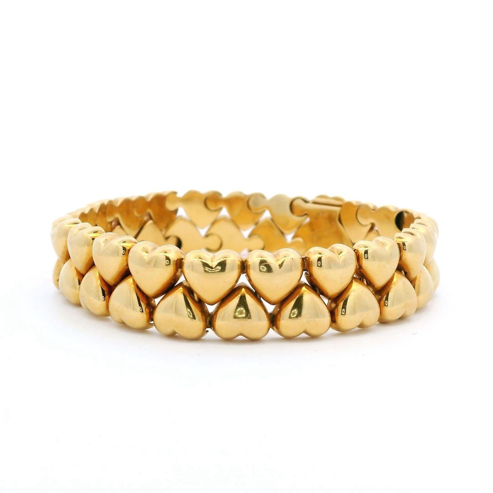 Rétro Vintage Cartier Bracelet Double Coeur Or Jaune 18 carats en vente