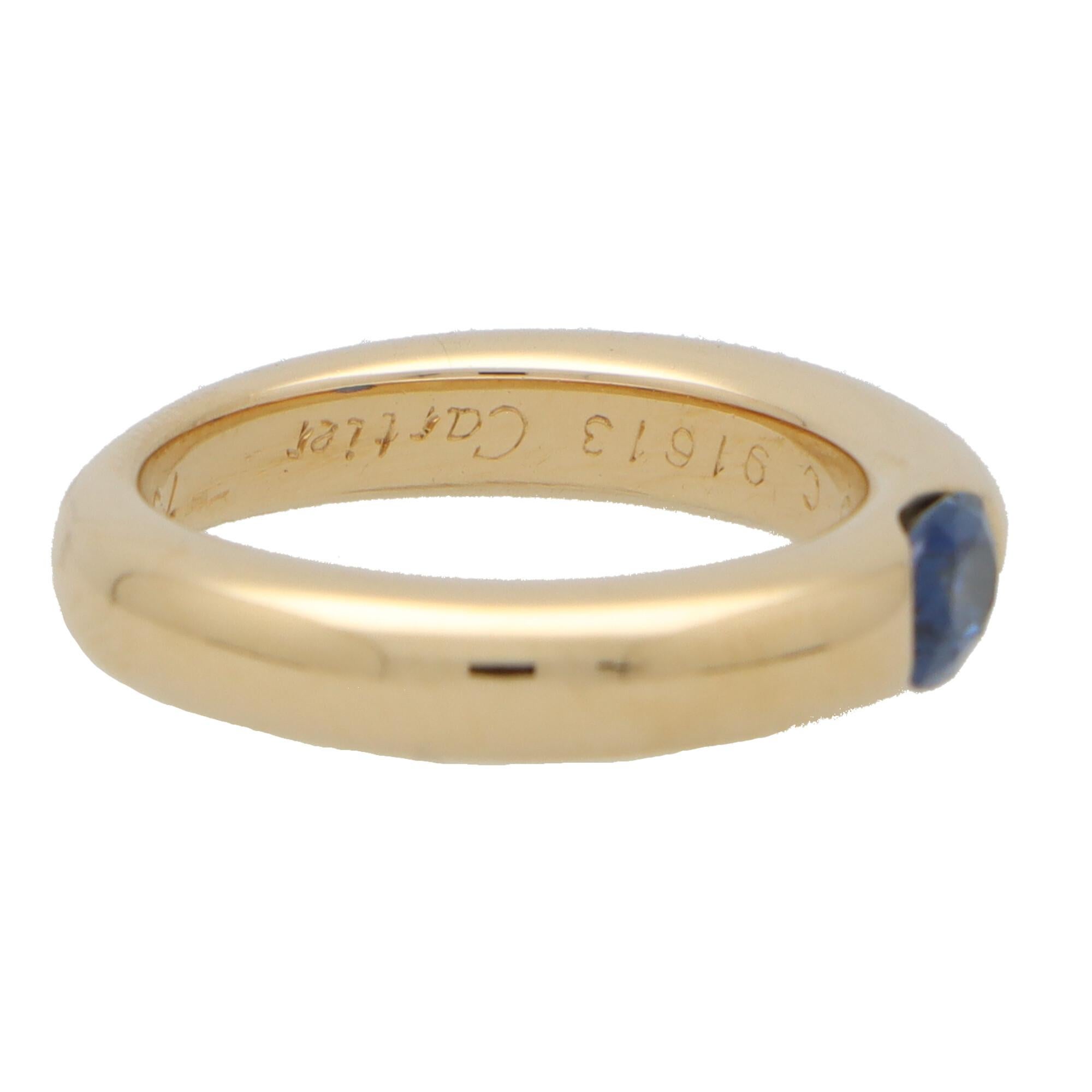 A beautiful vintage Cartier 'Ellipse' sapphire band ring set in 18k yellow gold. 

From the now discontinued Ellipse collection, the ring is solely set with a vibrant oval cut blue sapphire. The sapphire is securely bezel set within a 4-millimetre