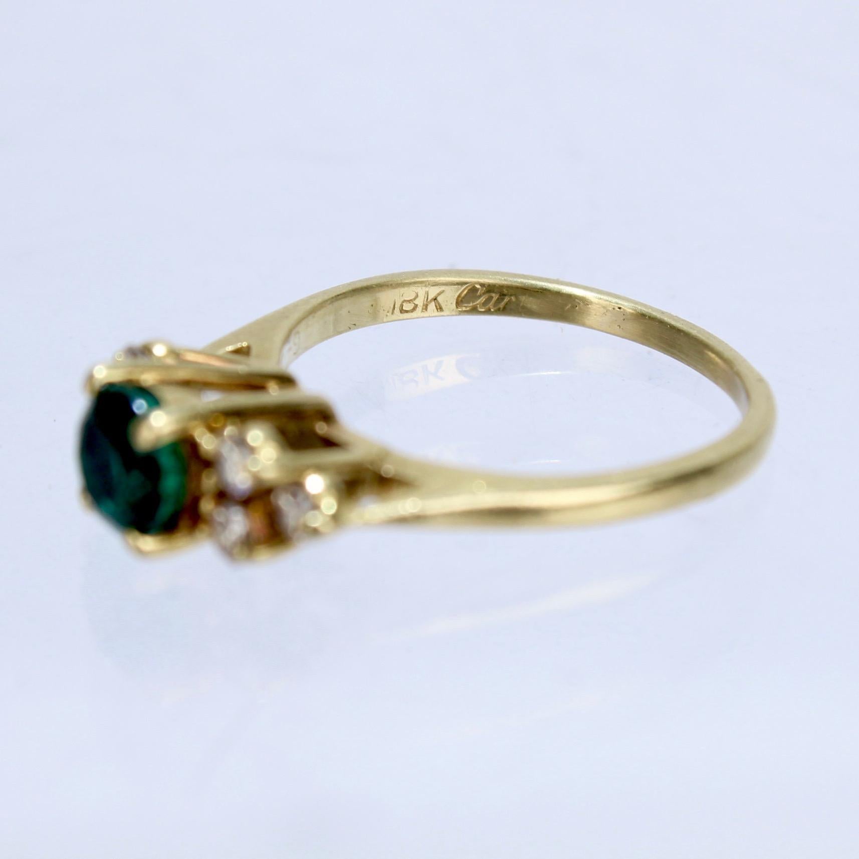Vintage Cartier Emerald, Diamond, and 18 Karat Gold Cocktail Ring In Good Condition In Philadelphia, PA
