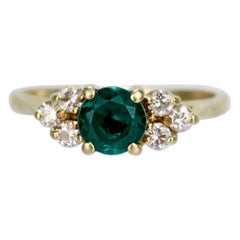 Vintage Cartier Emerald, Diamond, and 18 Karat Gold Cocktail Ring