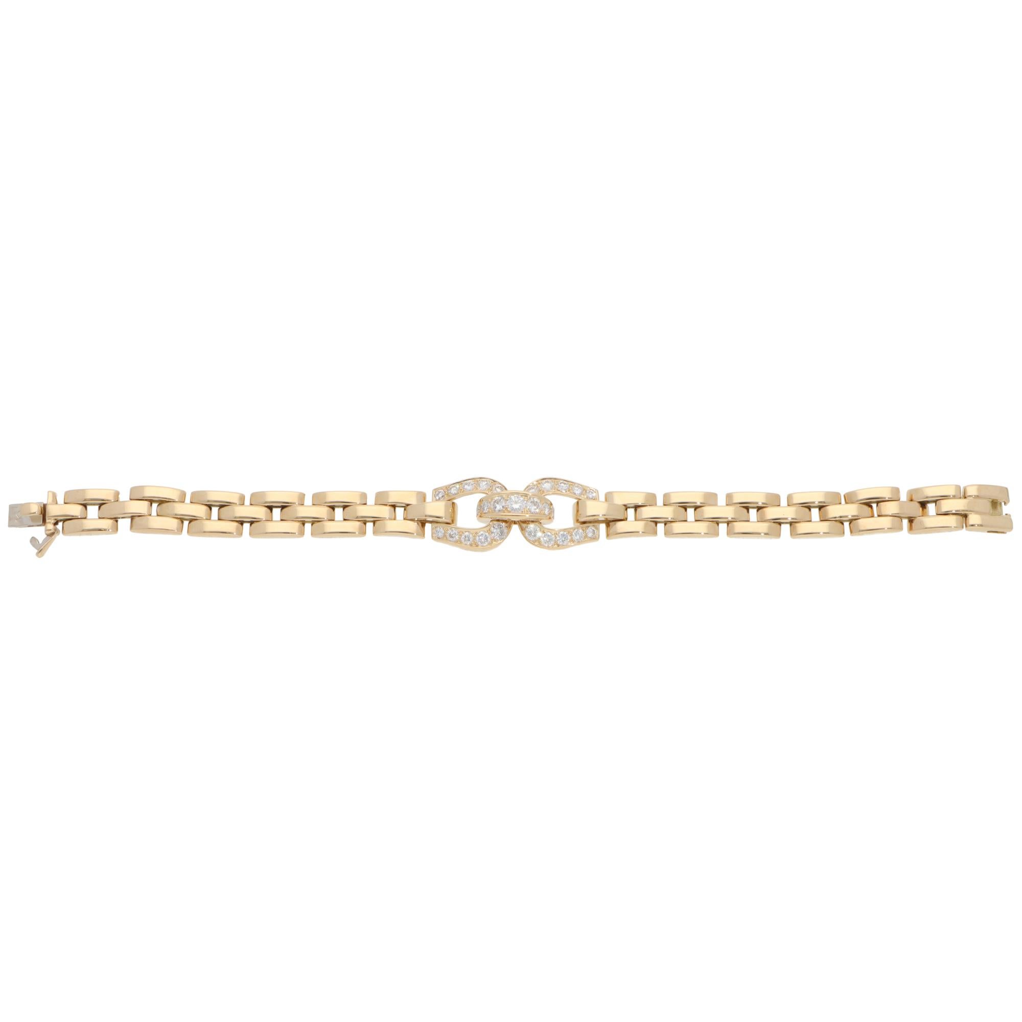 A beautiful vintage Cartier Etrier diamond bracelet set in 18k yellow gold, circa 1990s.

From the discontinued Etrier collection, the bracelet is centrally composed of Etrier motifs set with 27 round brilliant-cut diamonds. It is connected with