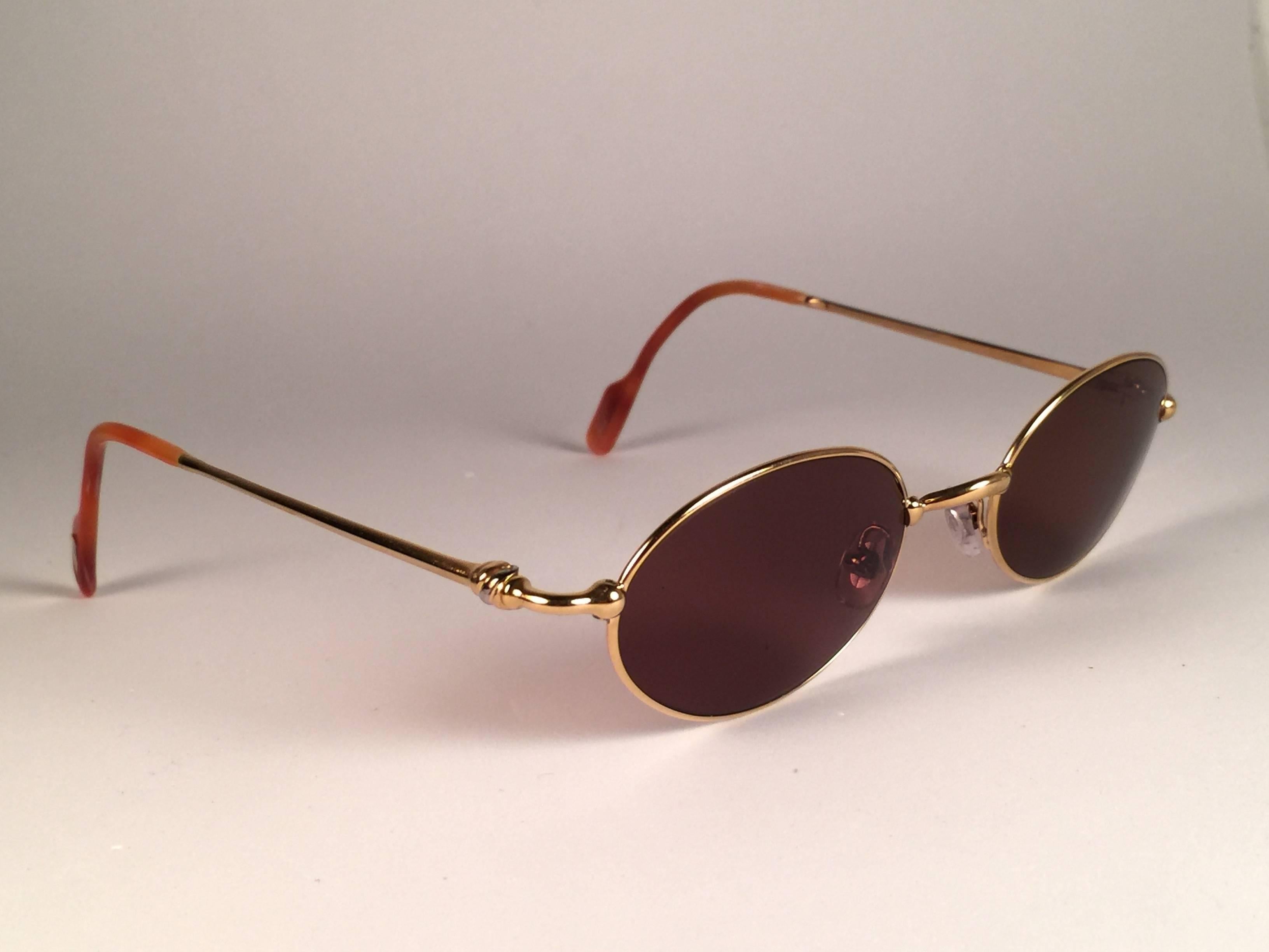 Women's or Men's Vintage Cartier Filao 47MM Oval Gold Plated Brown Lens France 1990 Sunglasses For Sale