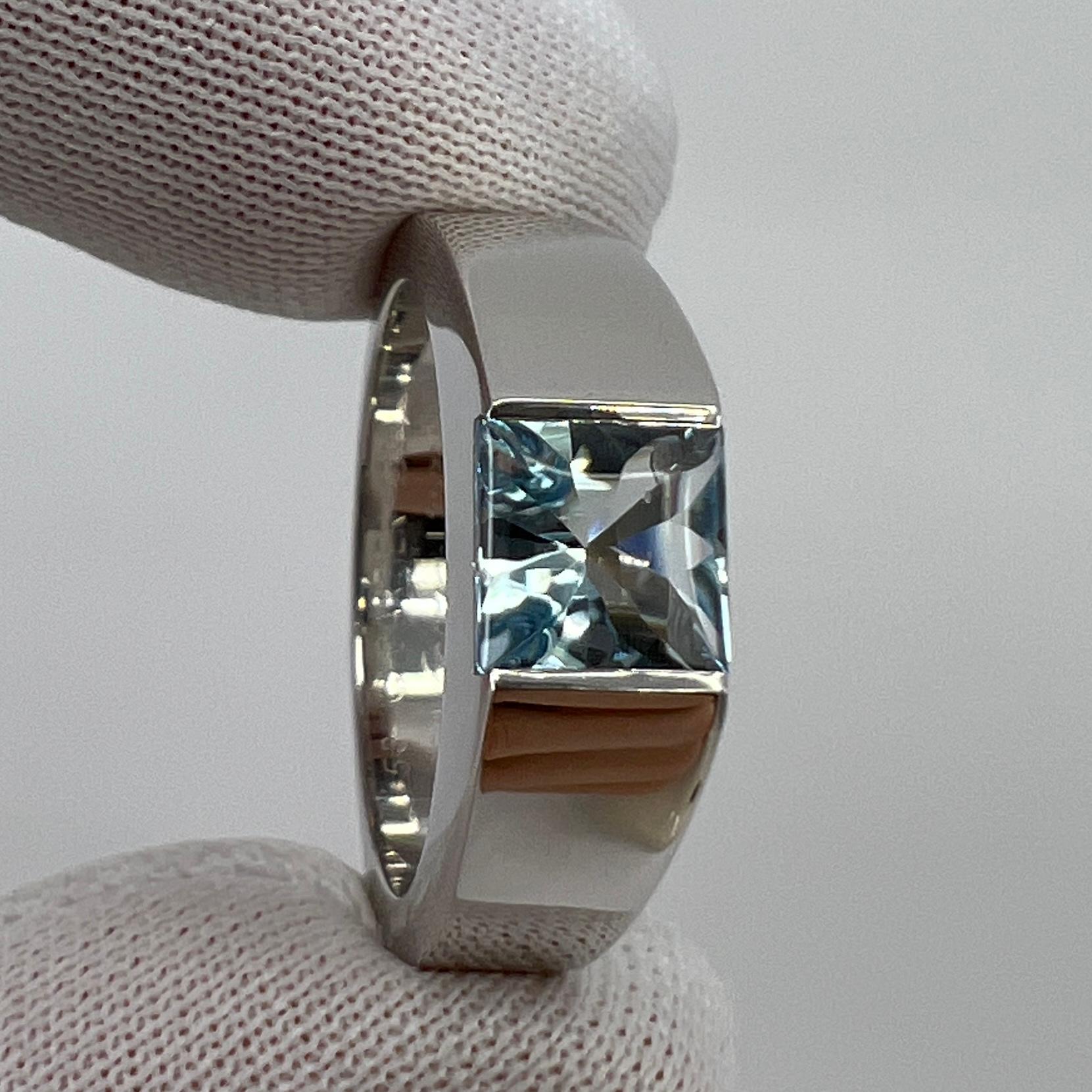 Vintage Cartier Fine Blue Aquamarine 18 Karat White Gold Tank Ring.

Stunning white gold ring with a 6mm tension set fine blue aquamarine. 
Fine jewellery houses like Cartier only use the finest of gemstones and this aquamarine is no exception. A