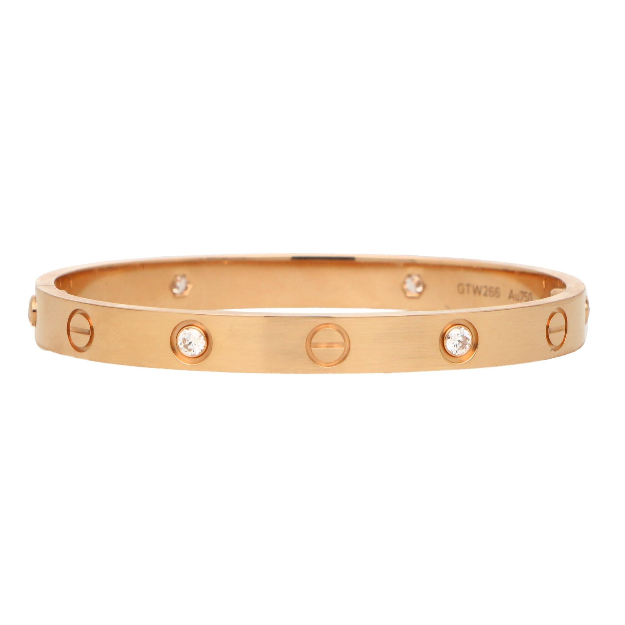 A classic four diamond Cartier Love bangle set in 18k rose gold.

The Love collection is a firm favourite of many mainly due to the simple, beautiful and elegant design. The bangle is composed of a 6-millimetre band with alternating diamonds and