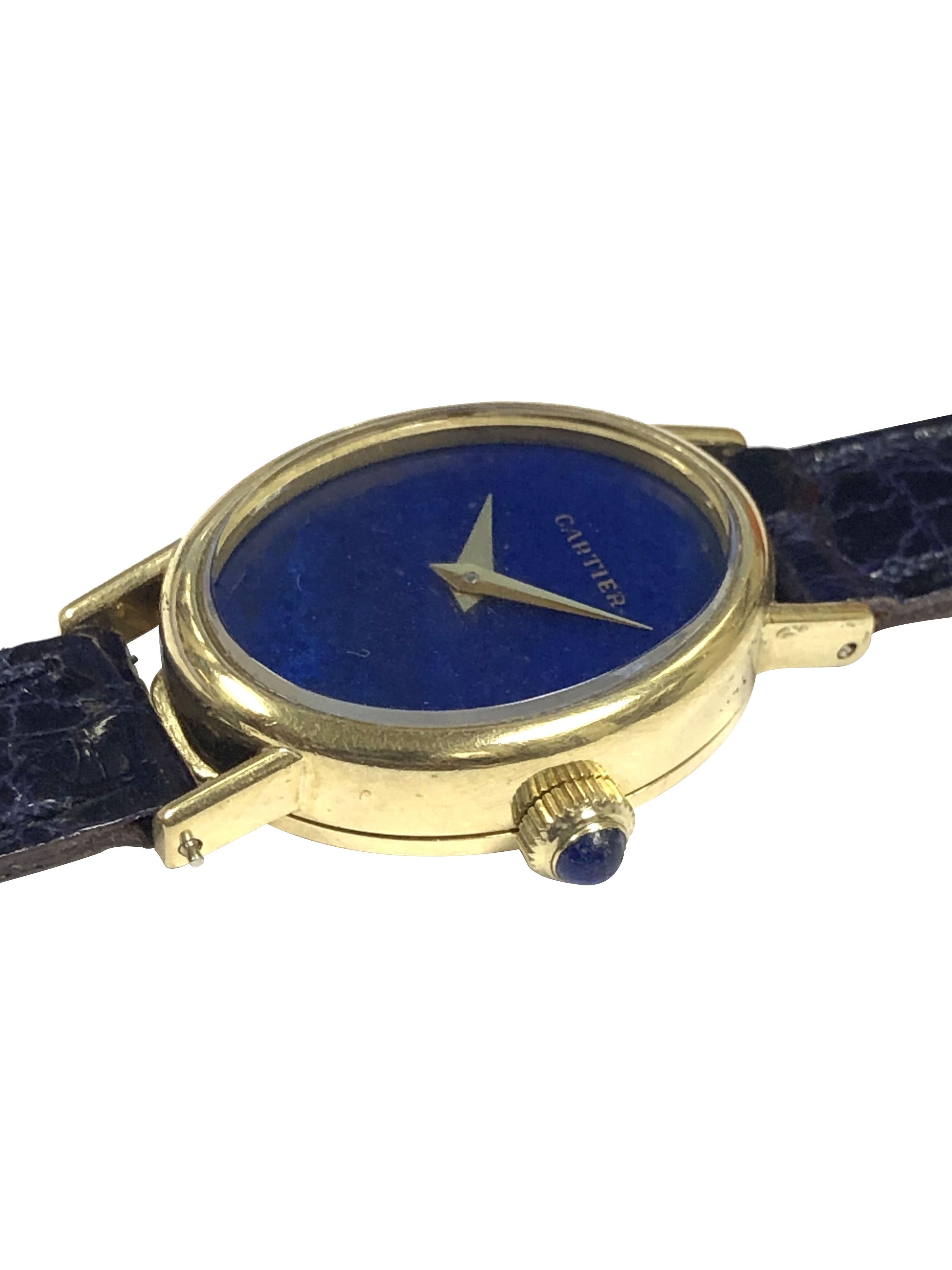 Circa 1970 Cartier Ladies Wrist Watch, 25 x 20 M.M 2 piece 18k Yellow Gold case. 17 Jewel Mechanical, Manual wind Concord Movement, Lapis Lazuli stone Dial. Lapis set Crown. New De Beer Burgundy - Brown Crocodile Strap. Cartier Control numbers on