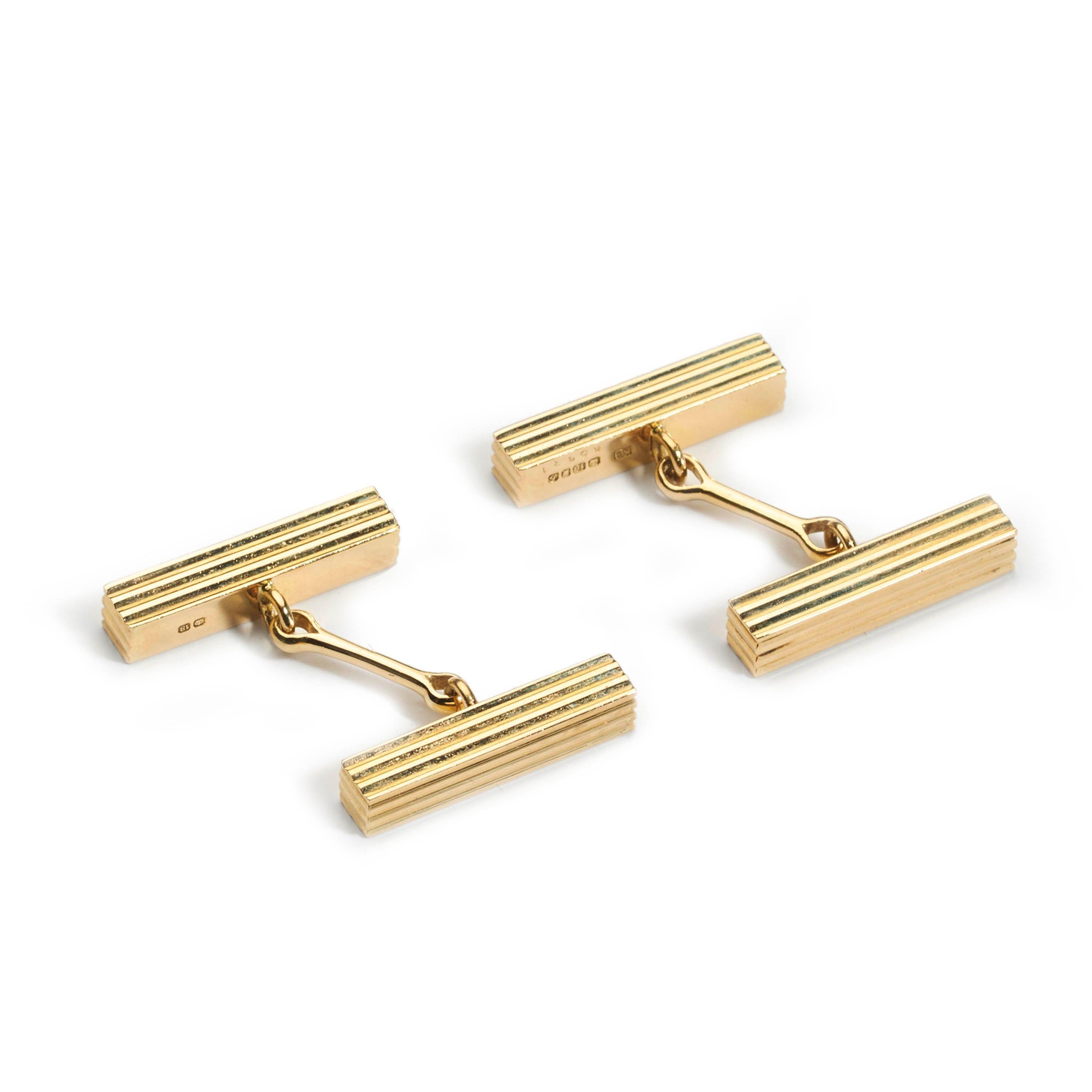 A pair of vintage, Cartier London, 18ct yellow gold, reeded square cross section, bar cufflinks, signed Cartier, numbered K6831, with JC maker's mark and London Hallmark for 1957, with bar fittings, in their original, Cartier signed, fitted, red epi