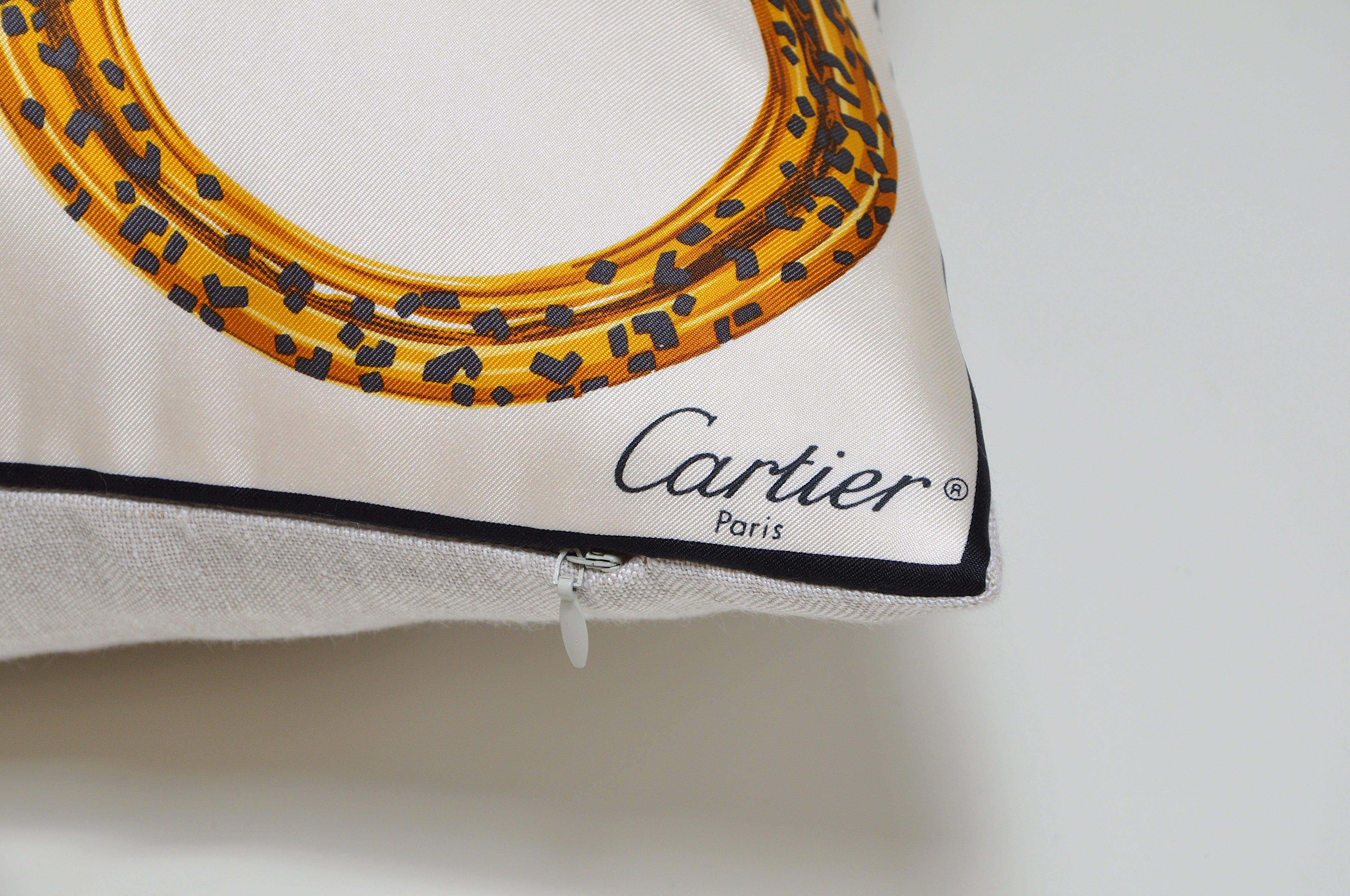 Custom made one of a kind luxury cushion (pillow) created from an exquisite vintage pure silk Cartier fashion scarf. It features their signature bejeweled bracelet with iconic panthers meeting head to head repeated across the silk in a set of six,