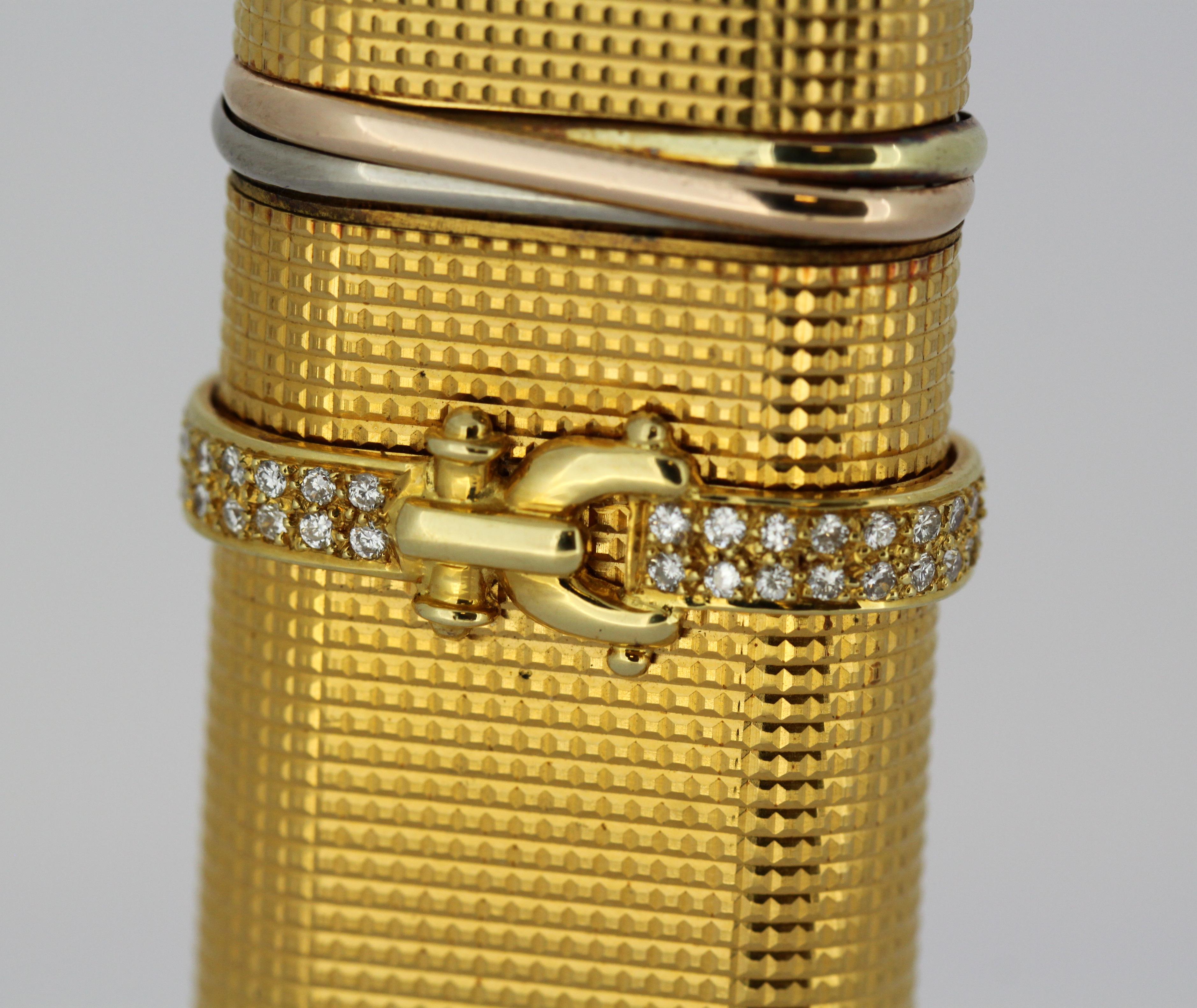 Vieux briquet Cartier plaqué or avec diamants 3