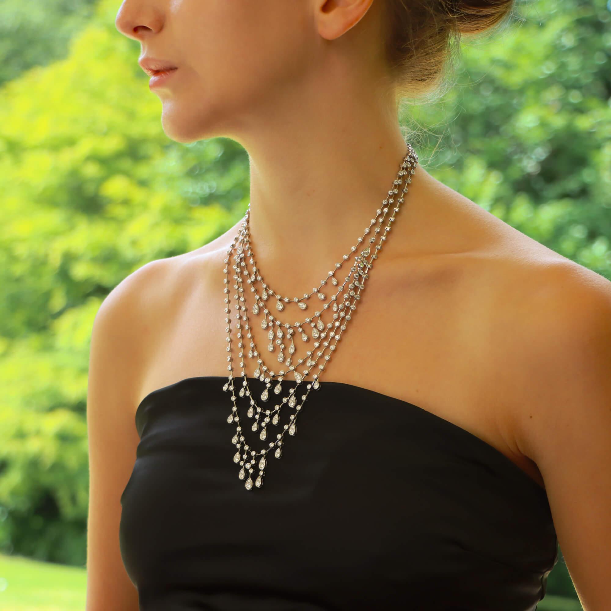  A visually staggering vintage Cartier 'Inde Mysterieuse' diamond drop necklace set in platinum.


From the now discontinued Cartier 'Inde Mysterieuse' collection, the piece is composed of five diamond set strands. The diamonds are each encased in a
