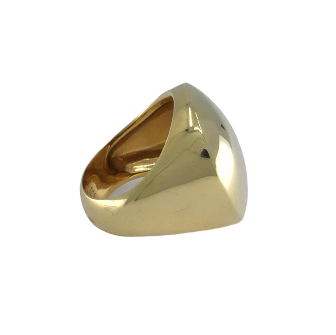 This vintage Cartier 'Jeton Sauvage' 18k gold dome ring, circa 1999, exemplifies the luxury and craftsmanship of Cartier. Weighing 13 grams, this size 6.75 ring features a striking large dome ornament measuring 22.4mm in length and 22.2mm in width.