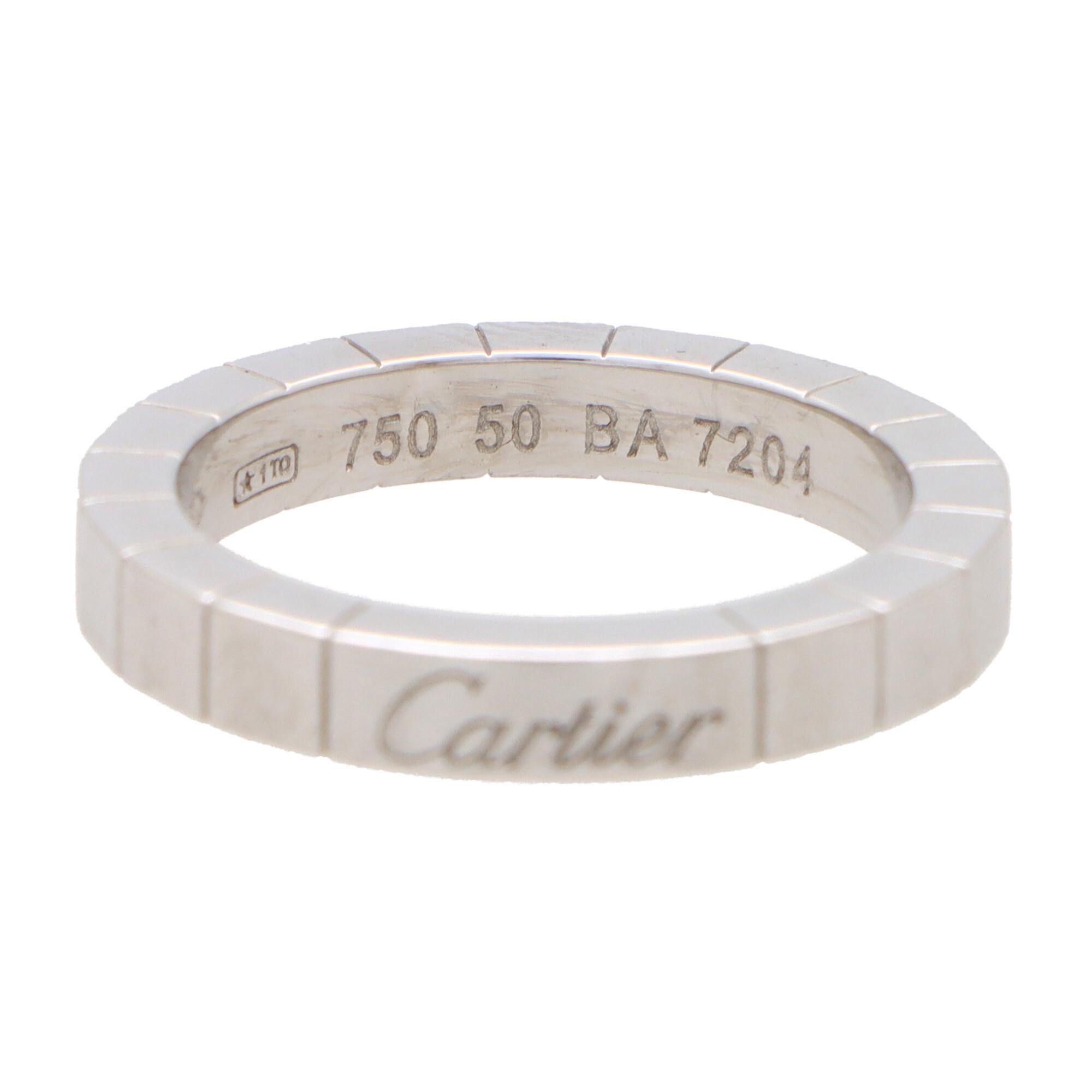  A stylish vintage Cartier Lanières ring set in 18k white gold.

The ring is composed in the iconic Cartier Lanières brick link design. Uniquely, to the opposite side of the band is the Cartier signature, which gives the wearer the option to wear